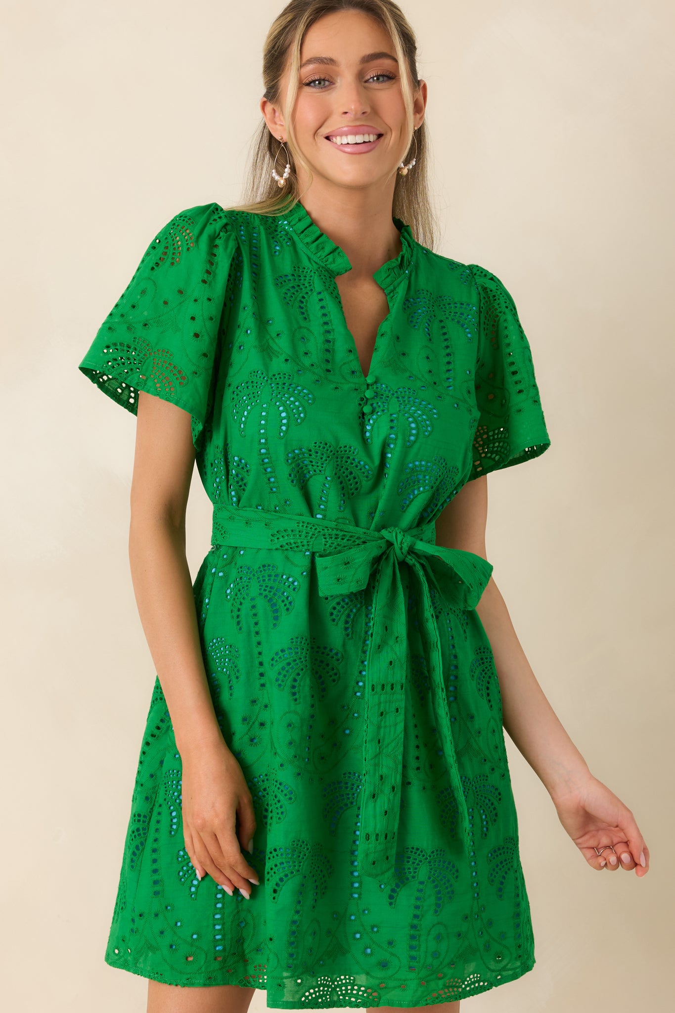 Textured cotton eyelet fabric highlighting lightweight and breathable design.