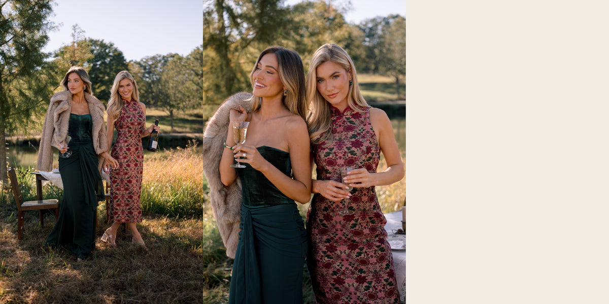 Dressy Thanksgiving outfits: emerald velvet strapless maxi dress with a taupe faux fur jacket and a burgundy floral mock neck midi dress at a lakeside table