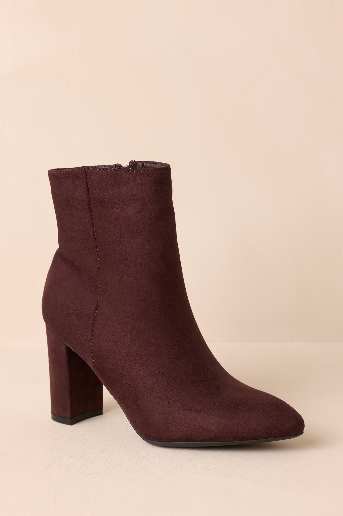 Three-quarter view highlighting the outer seam detail and overall shape.
