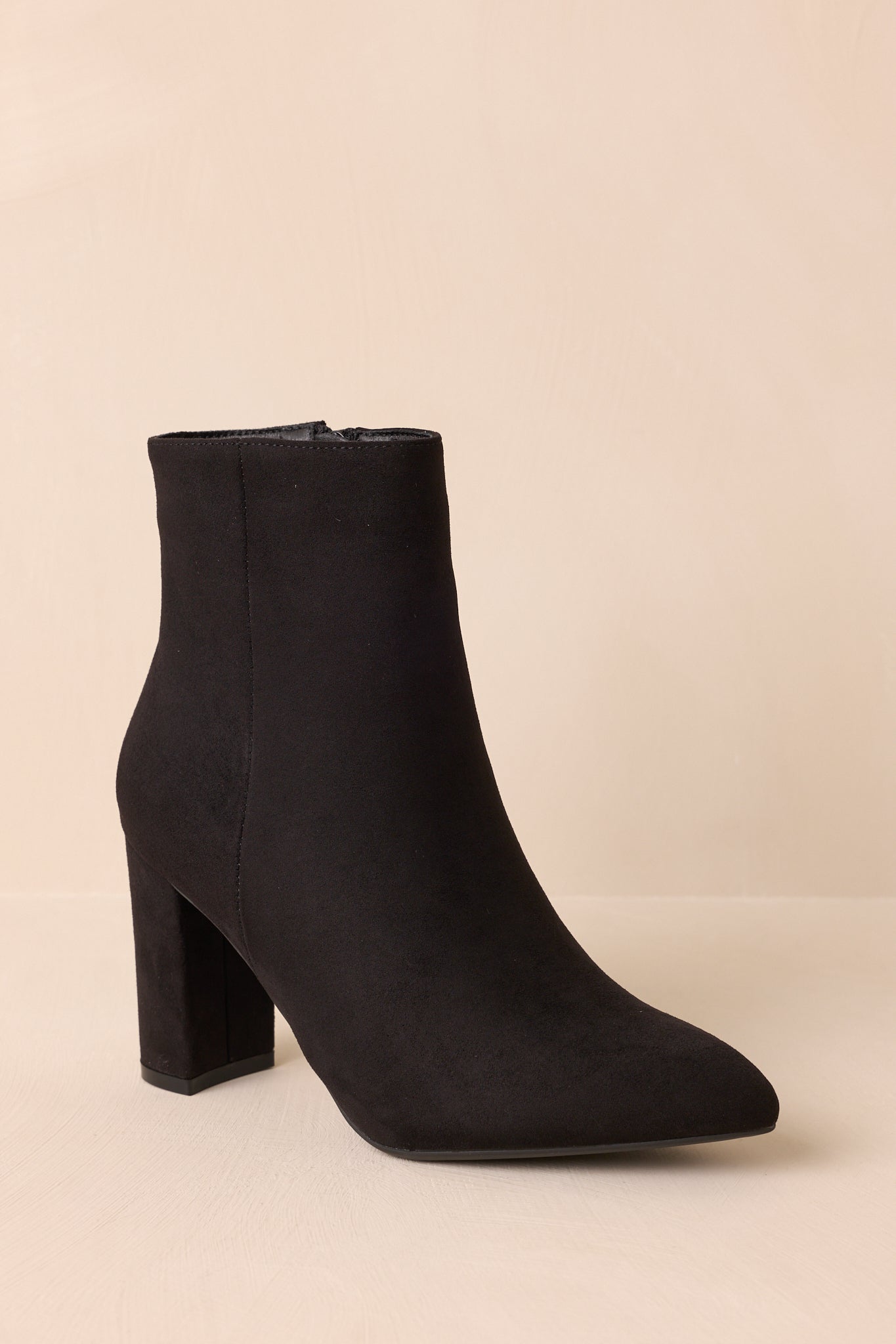 Three-quarter view highlighting the outer seam detail and structured shape