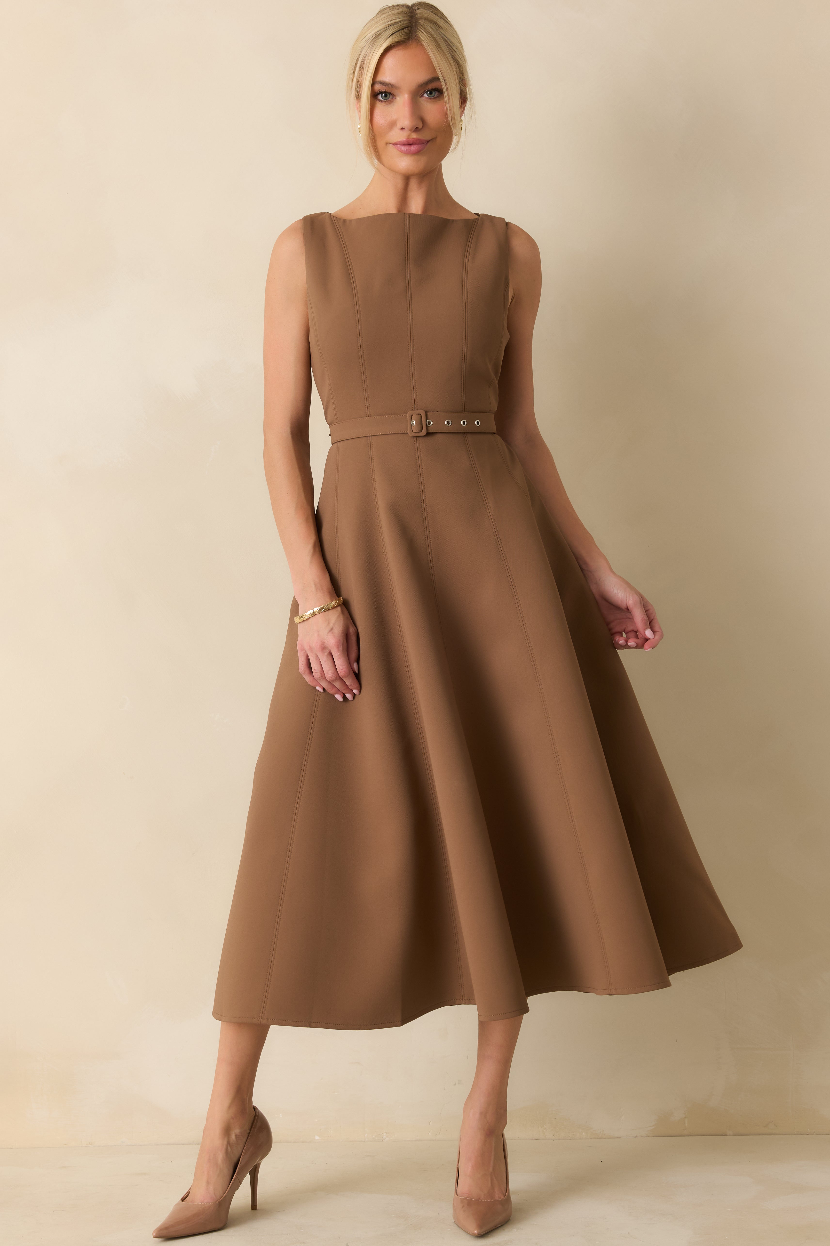 Flowy toffee brown A-line dress with a smooth silhouette and structured bodice.