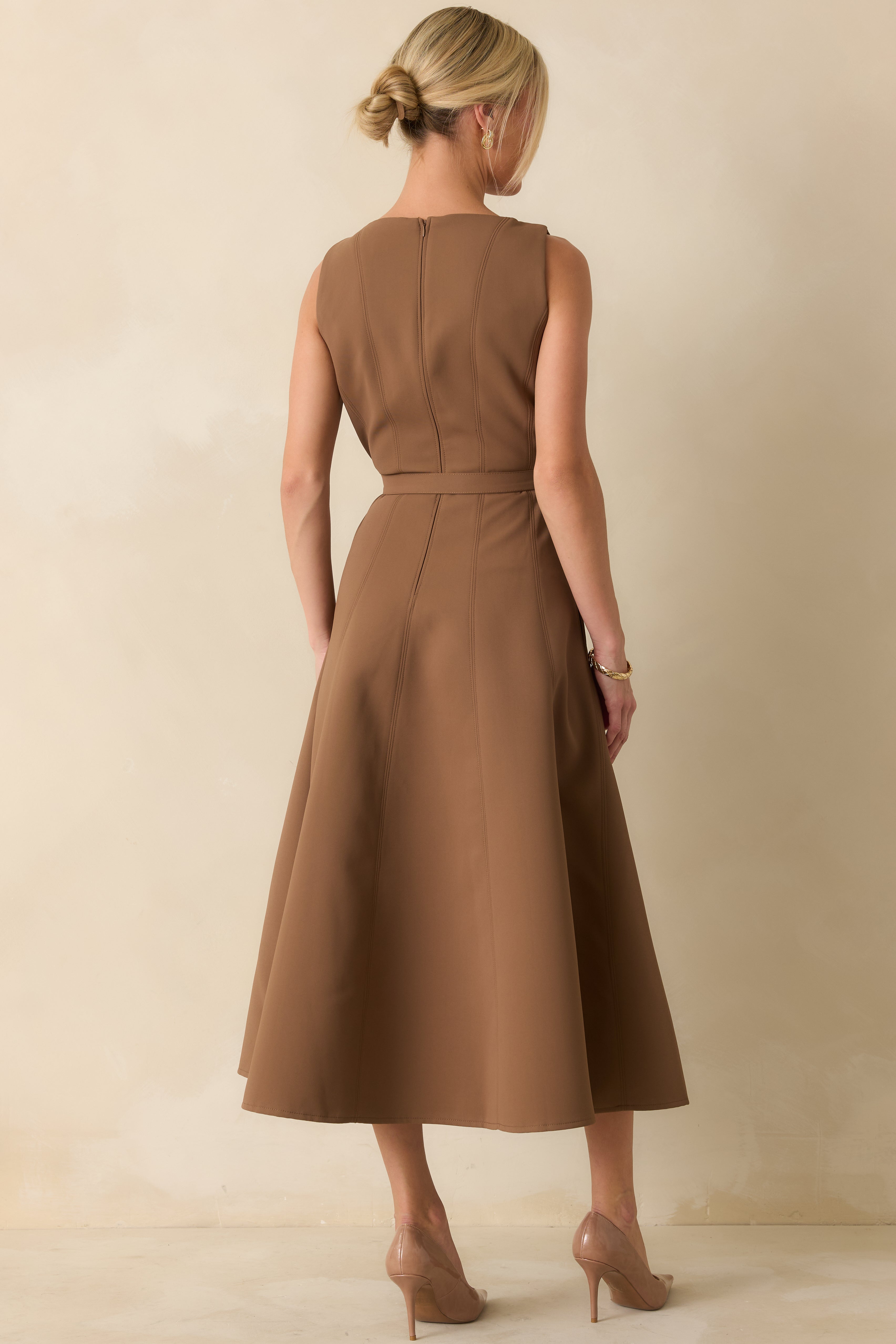 Rear view of the toffee brown midi dress showcasing the concealed zip closure and A-line shape.