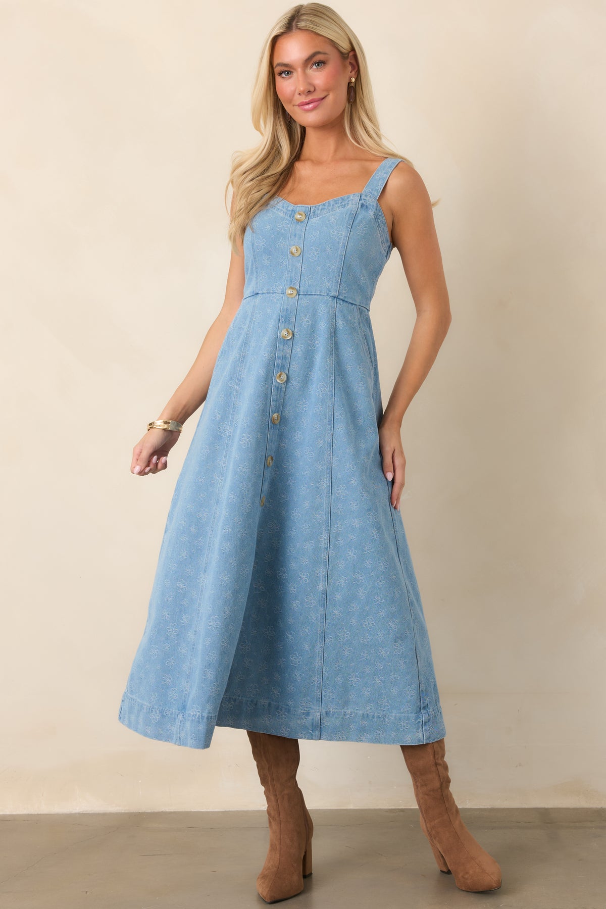Tonal floral denim midi dress showcasing its sweetheart neckline, fitted waist, and softly flowing A-line skirt.