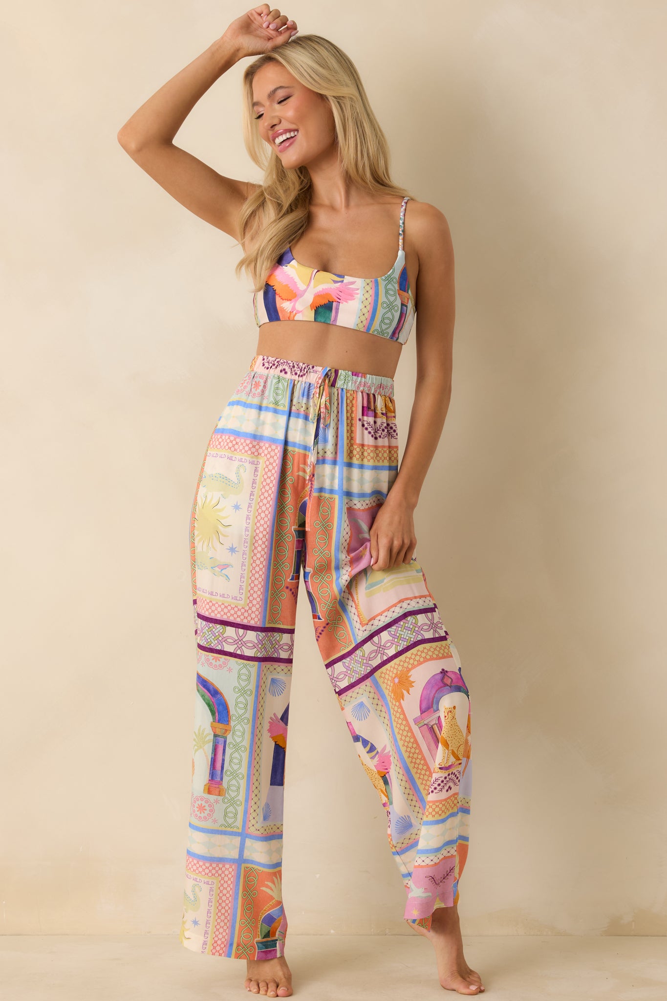 Tropical multicolor pants showcasing the breezy woven fabric and easy wide-leg movement.