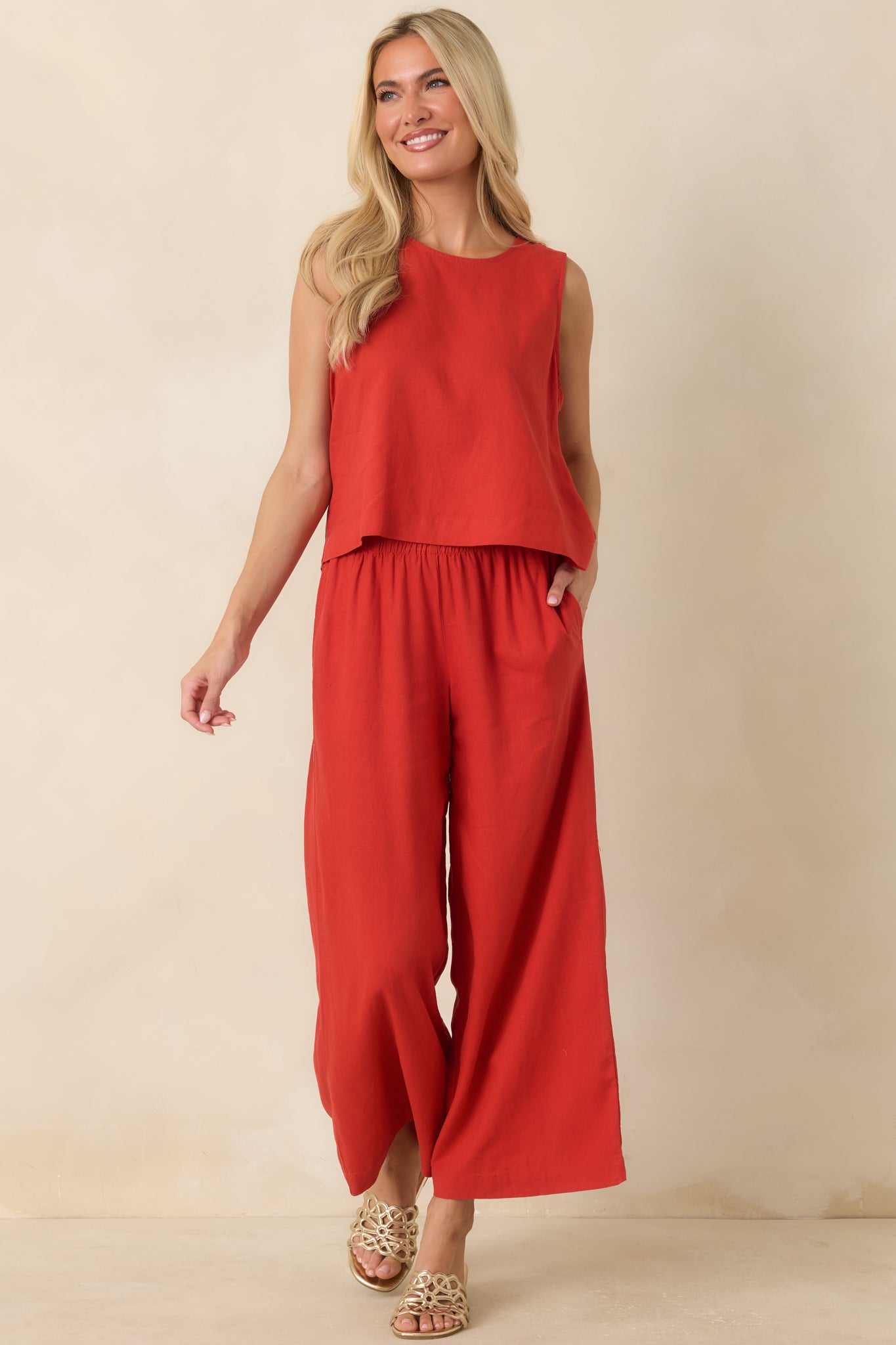 Vibrant chili pepper red pants showcasing a comfortable relaxed shape and timeless appeal.