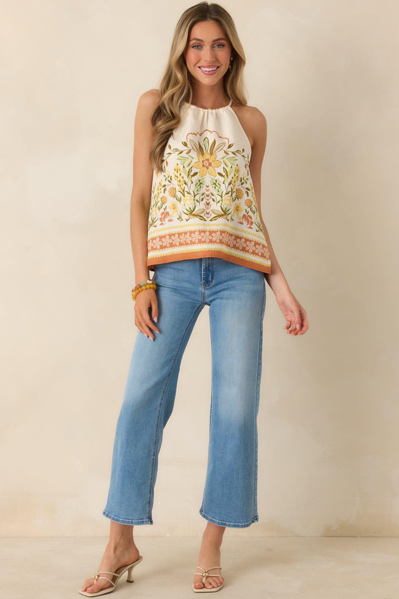 Vibrant floral top with delicate straps and relaxed, easy silhouette