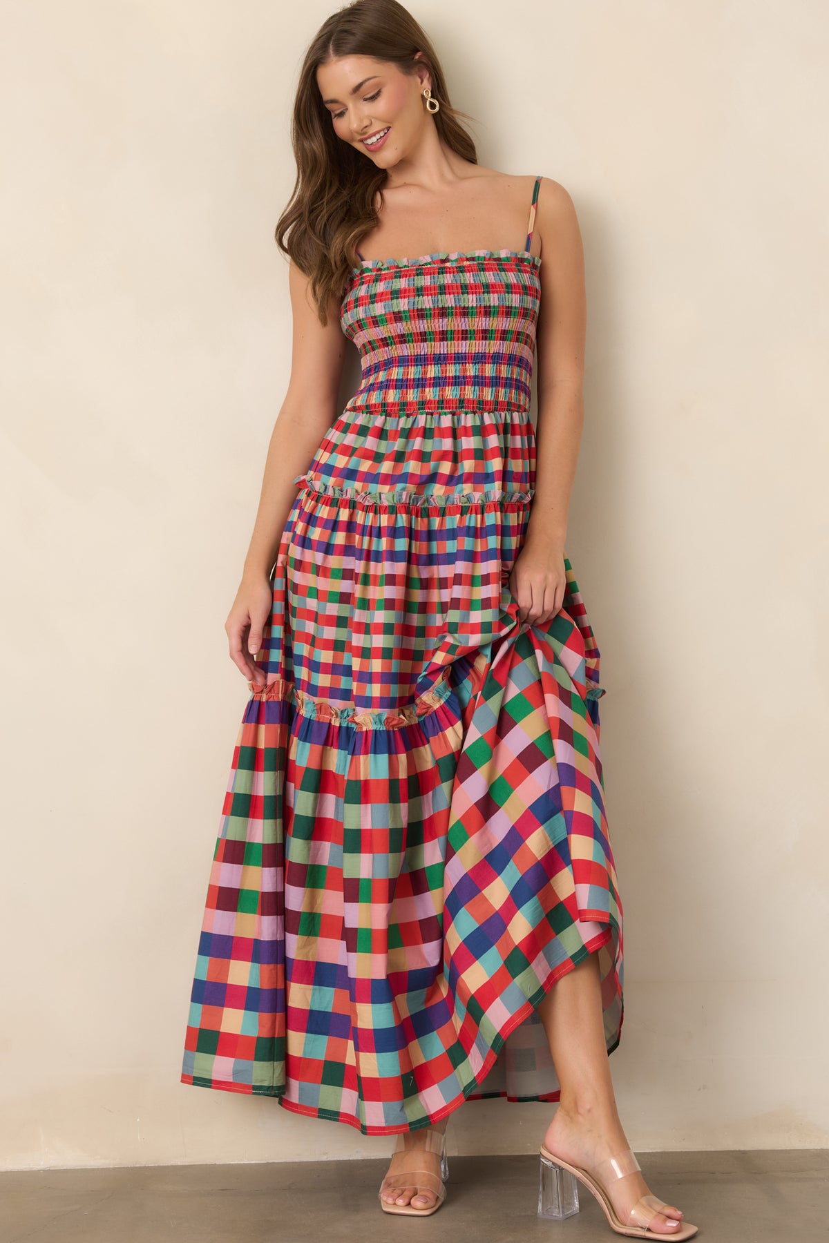 Vibrant red multi plaid maxi dress with adjustable spaghetti straps and a ruffled straight neckline.
