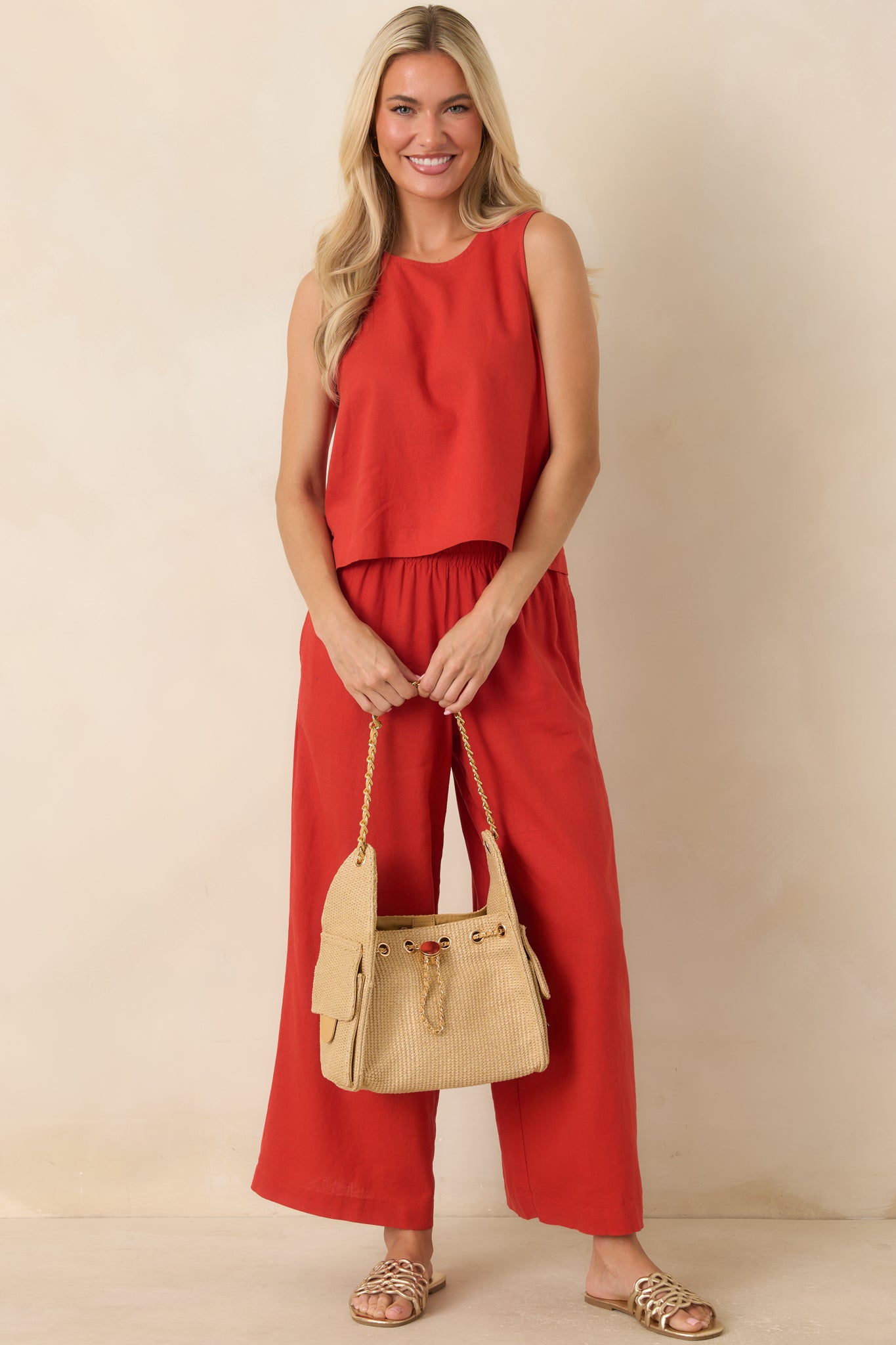 Vibrant red tank top showcasing a relaxed silhouette and clean round neckline.