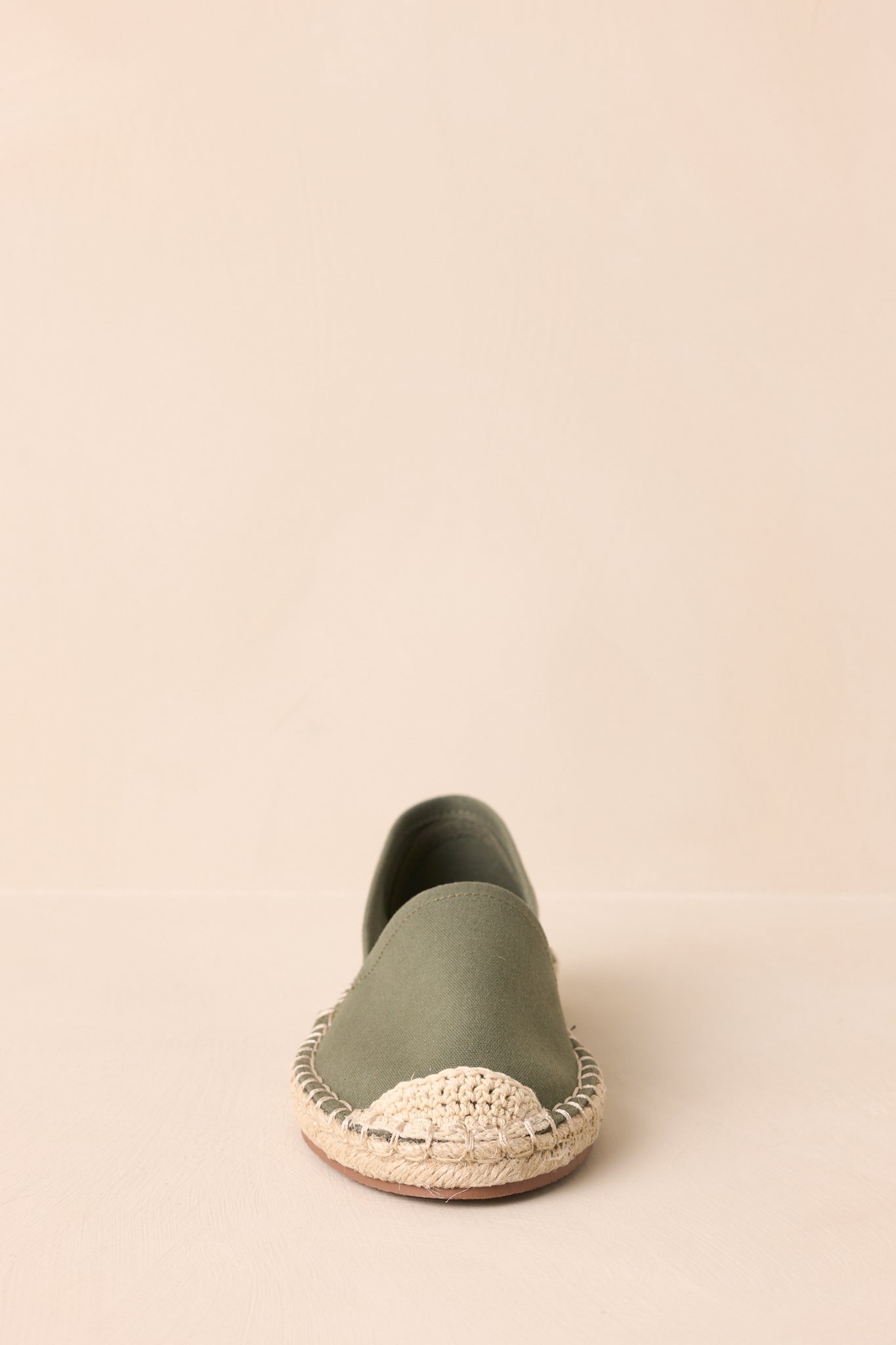 A closer view focusing on the toe area of the shoe, capturing the fine crochet detailing and rounded shape.