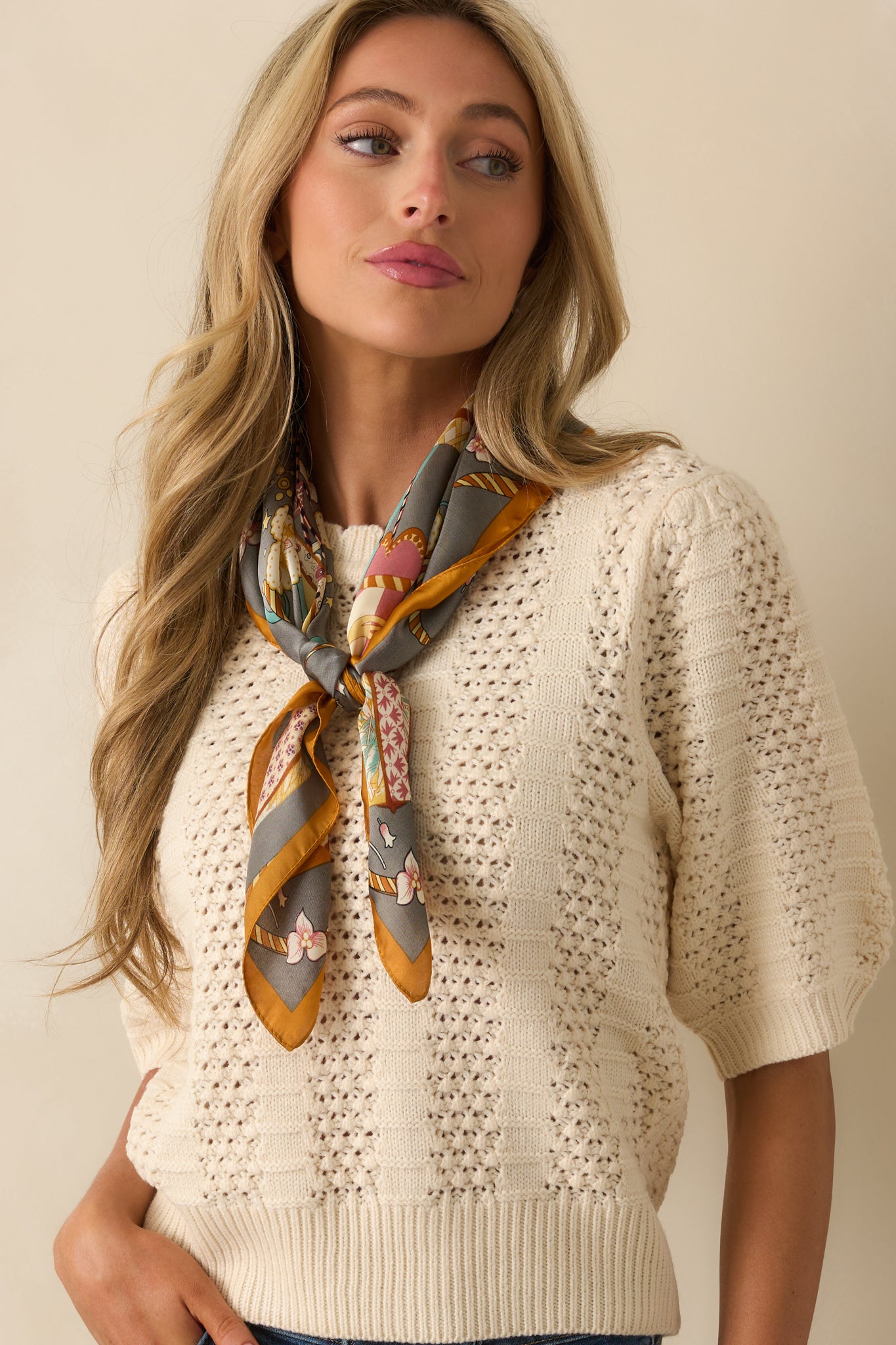 Cropped view highlighting the open crochet-knit and ribbed panel details.