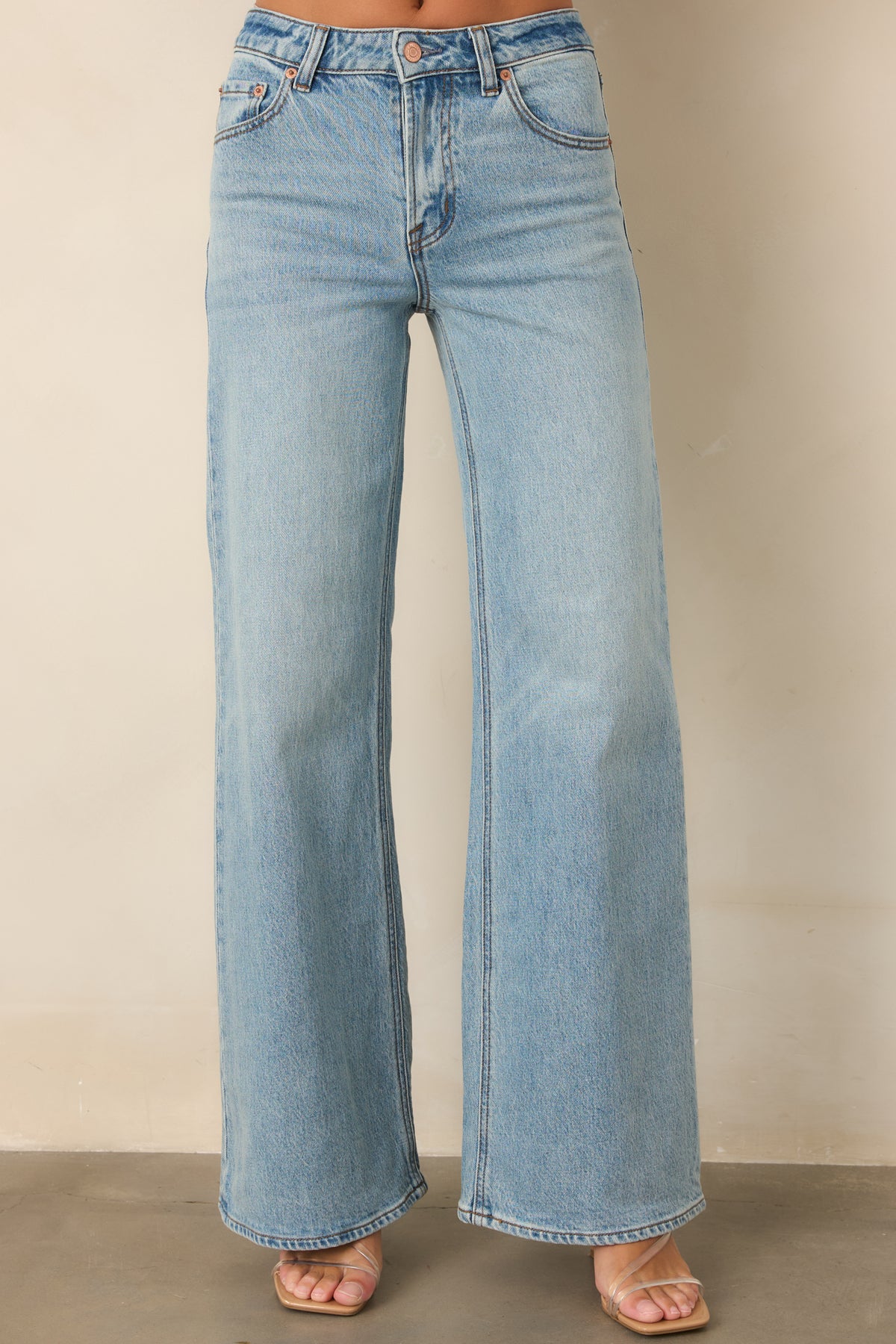 Vintage-inspired jeans with a light wash, classic five-pocket styling, and full-length wide legs.