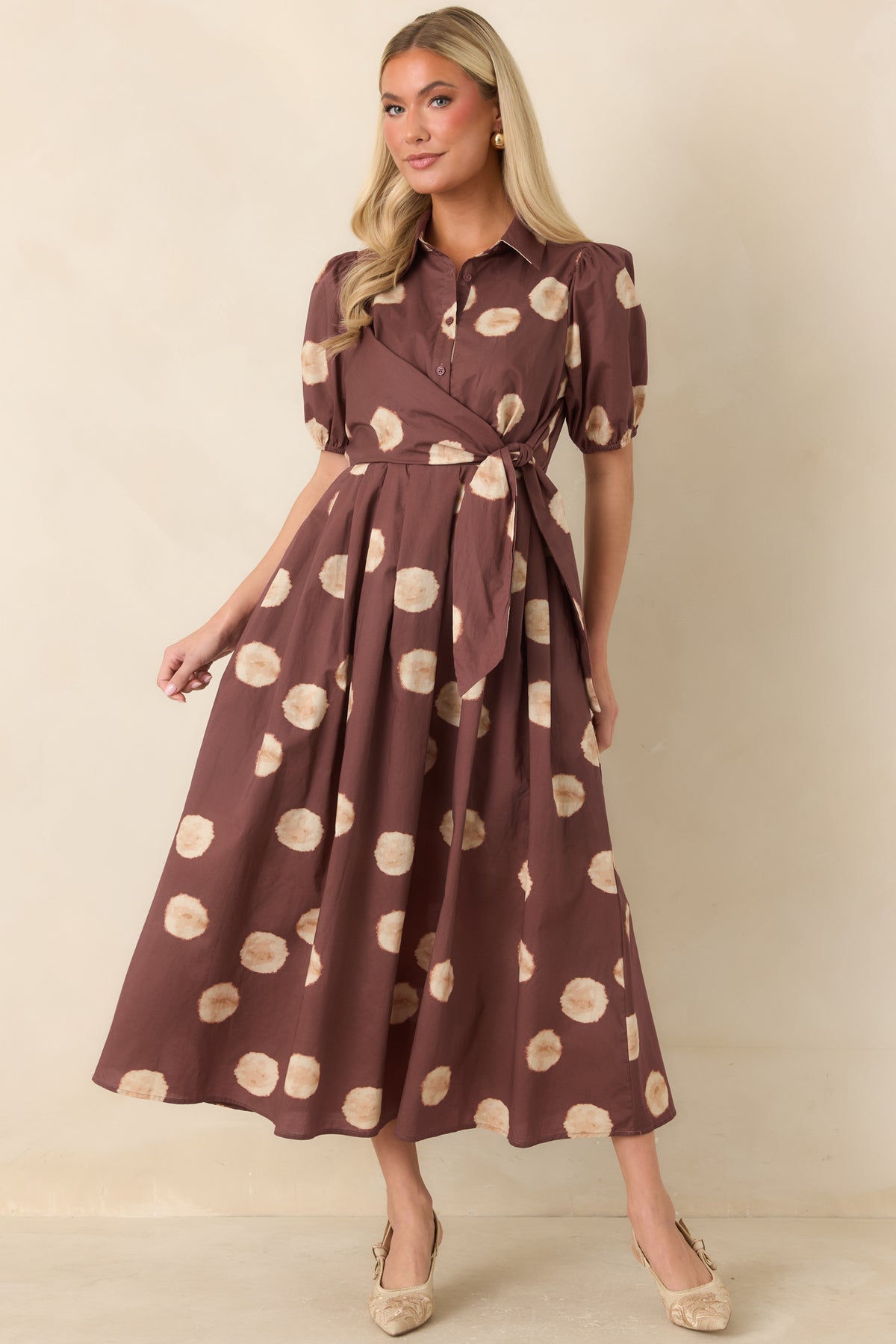 Vintage-inspired midi dress featuring a wrap-inspired side tie and softly gathered waist.