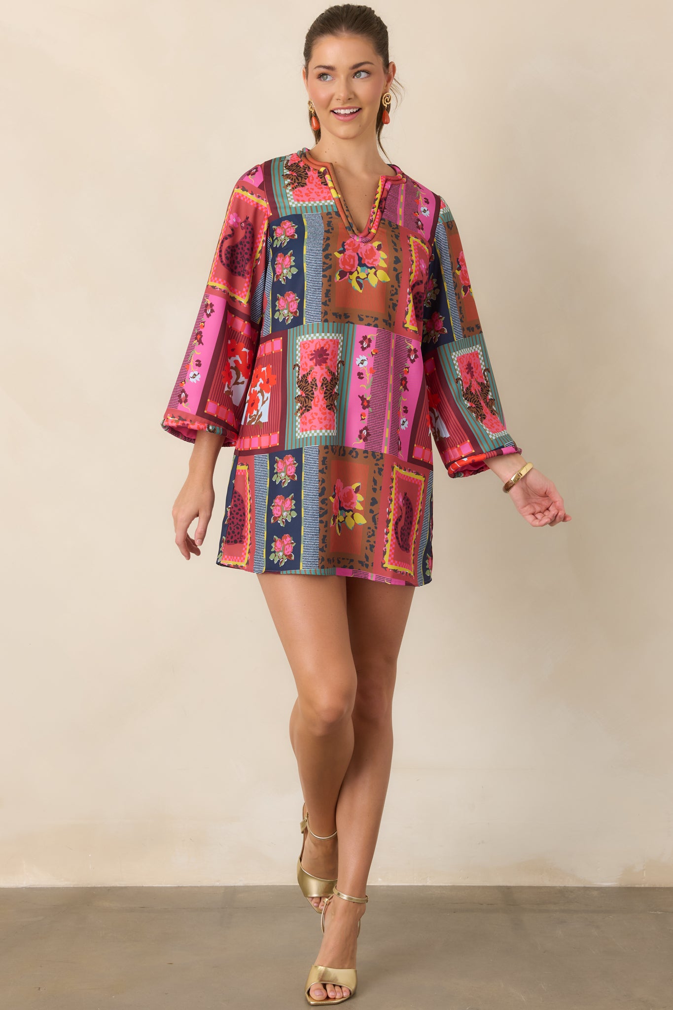 Structured poly twill mini dress showcasing the vibrant Vintage Vignette print, subtle sheen, flowing A-line shape, and wide three-quarter sleeves.