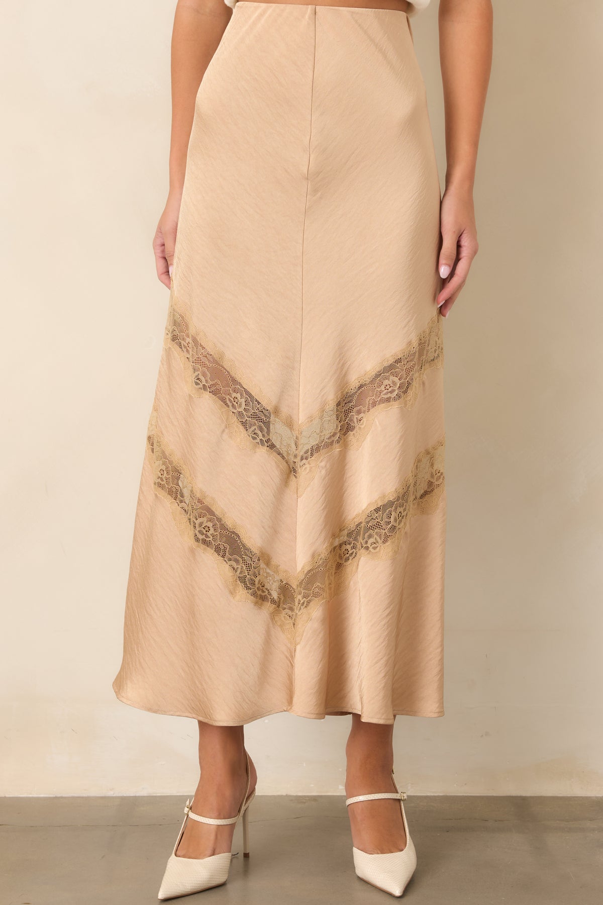 Warm tan skirt showcasing the tonal lace insets along the lower skirt.