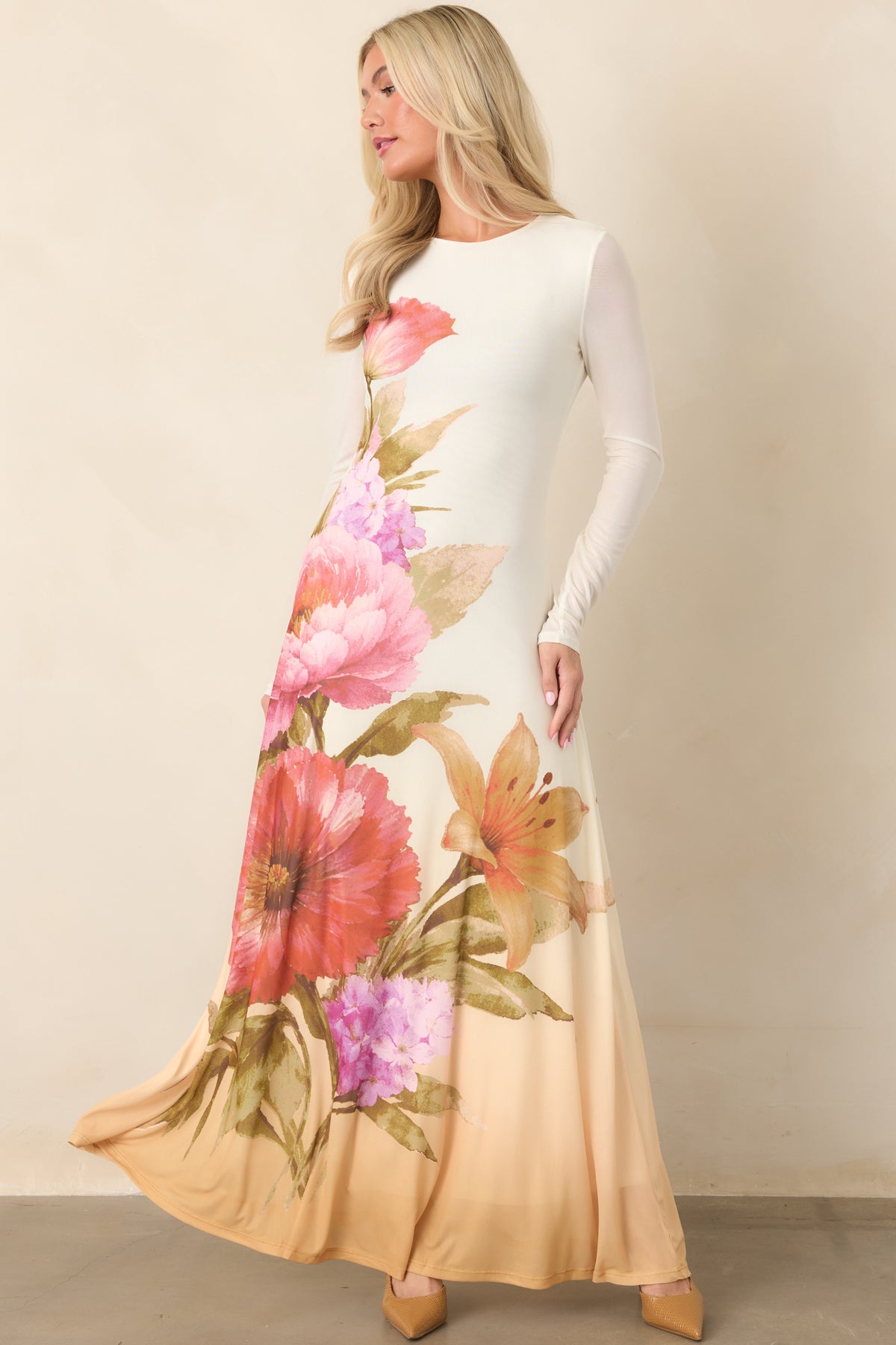 Watercolor floral maxi dress with a softly deepening caramel hem.