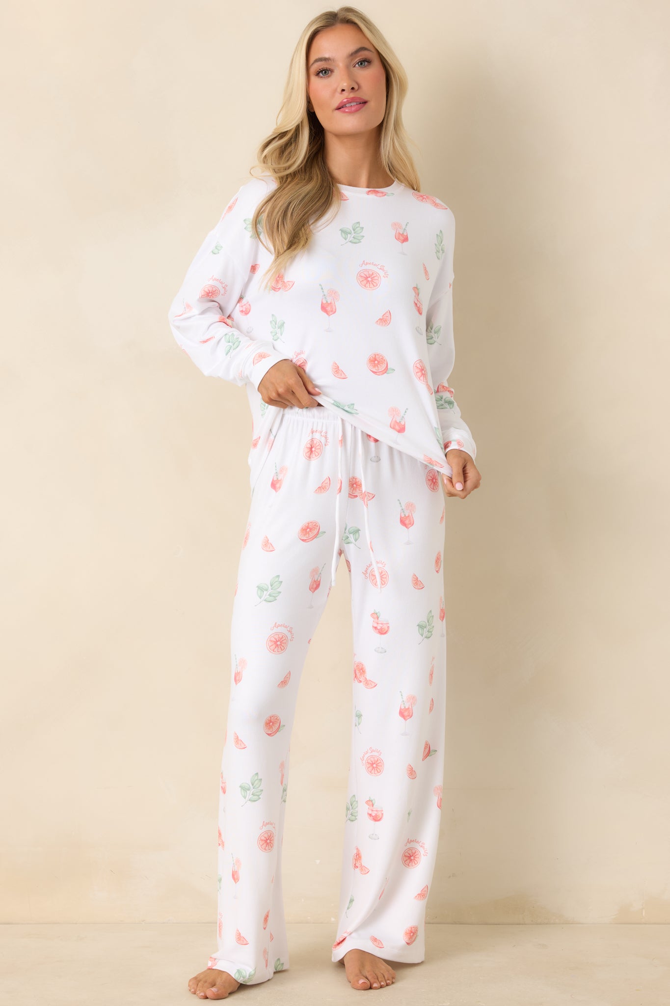 White long sleeve pajama top with citrus and cocktail print, and relaxed fit.
