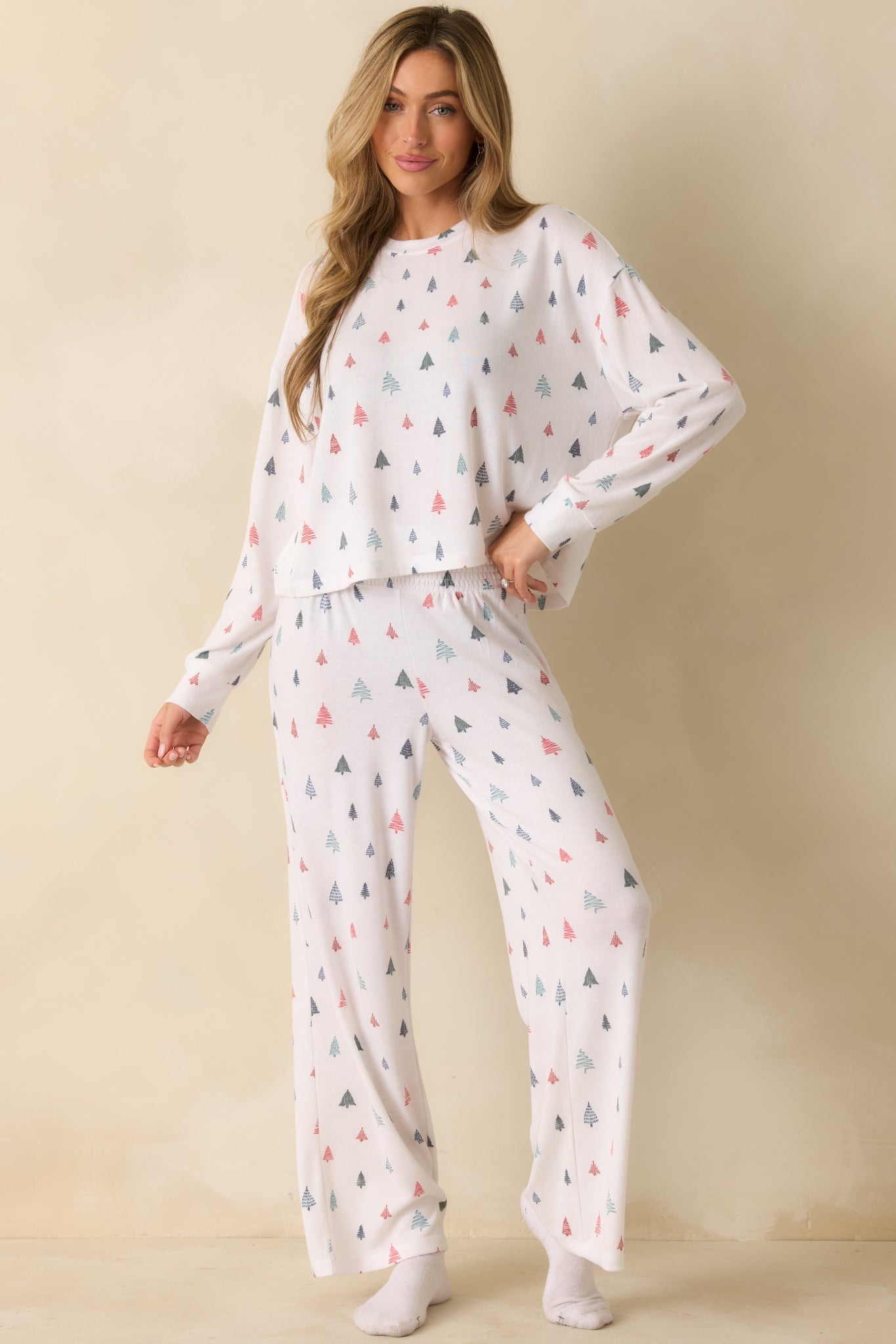 White multi pajama top with relaxed silhouette, crew neck, and lightweight brushed knit texture for seasonal comfort.