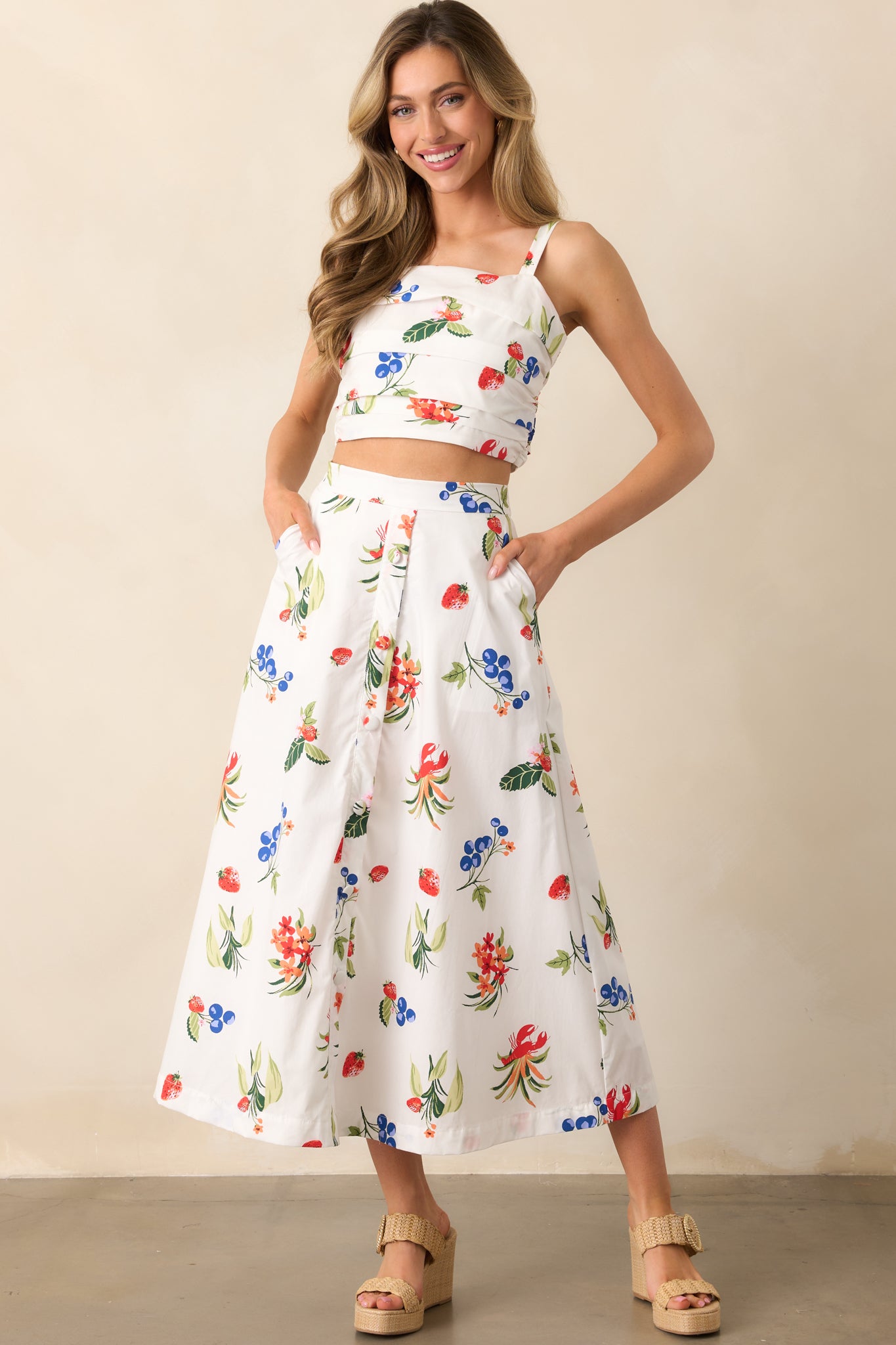 A white skirt with a faux button front design and handy pockets, creating a crisp and classic look.