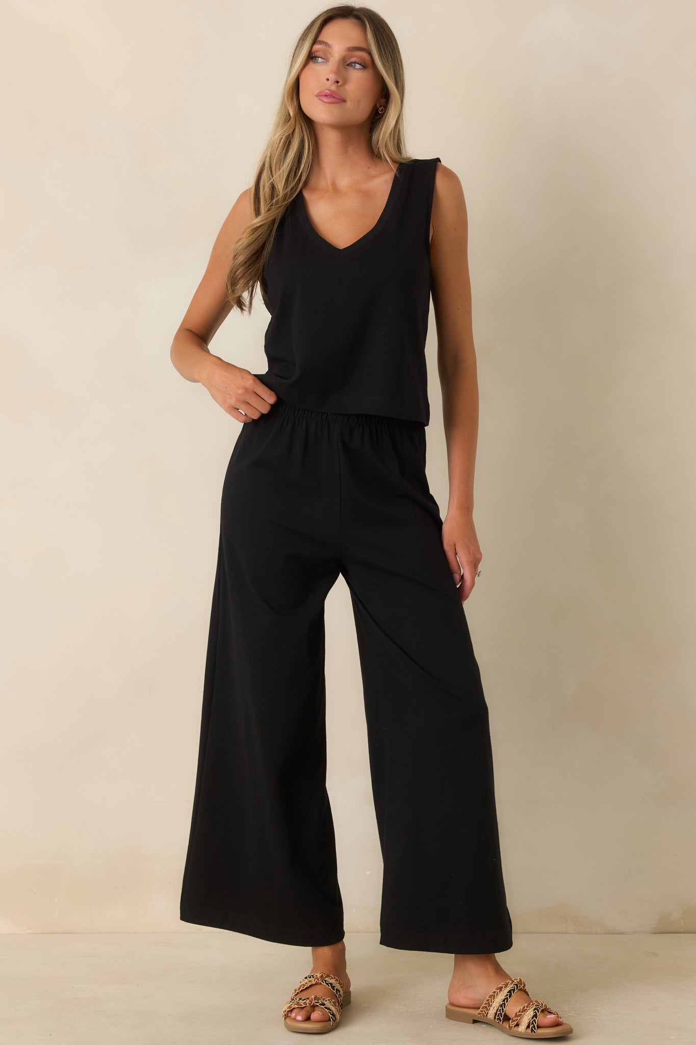 Wide leg black pants designed with a high-rise fit and effortless everyday comfort.