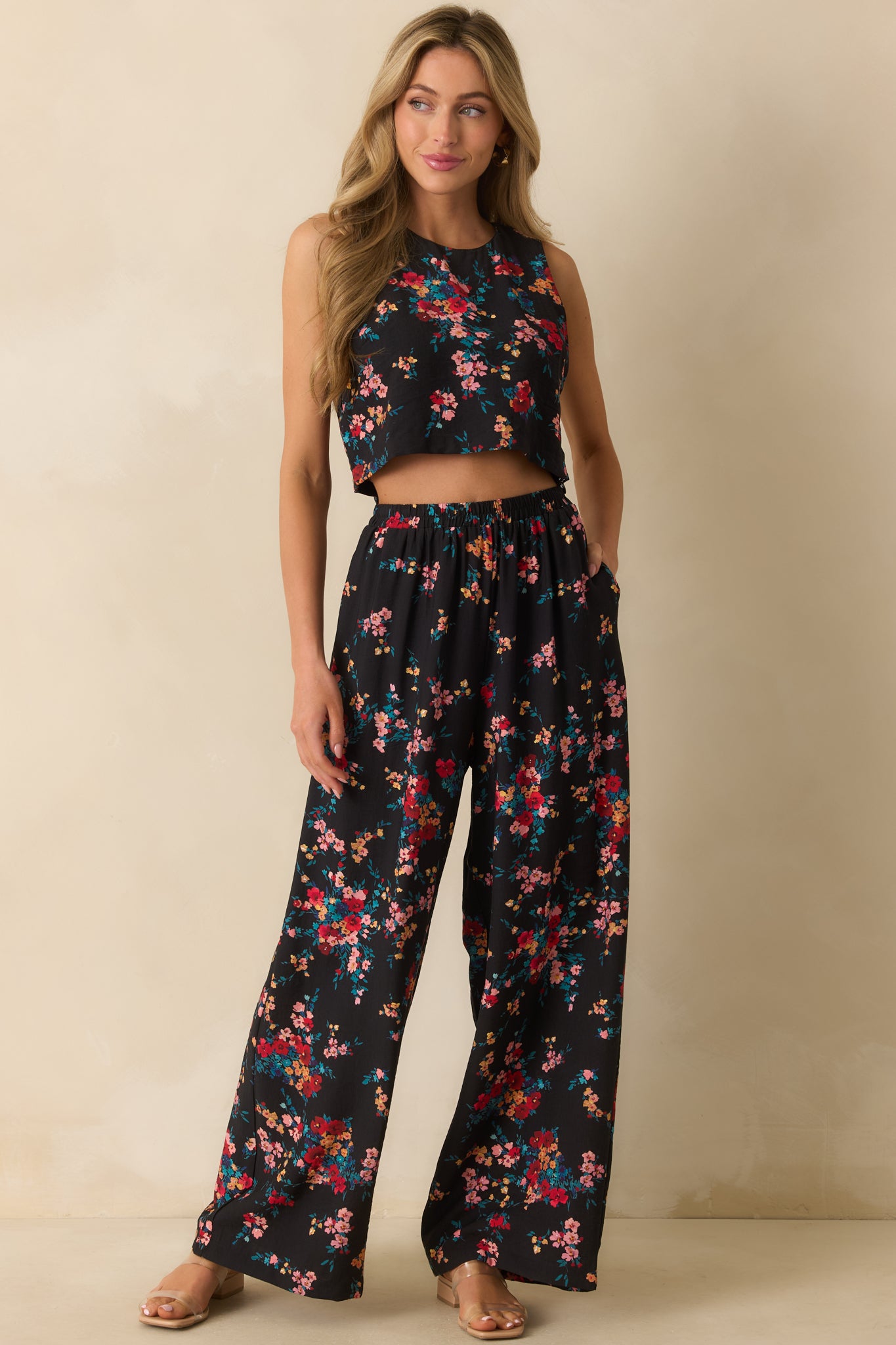 Wide-leg pants showing side pockets and smooth drape for a casual, airy look.