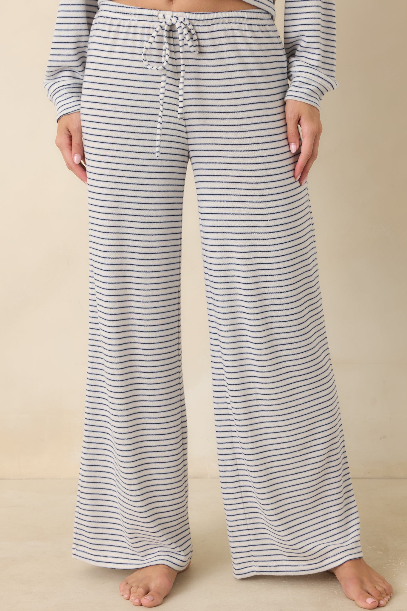 Wide leg pants showcasing the relaxed drape and comfortable sweater knit fabric.