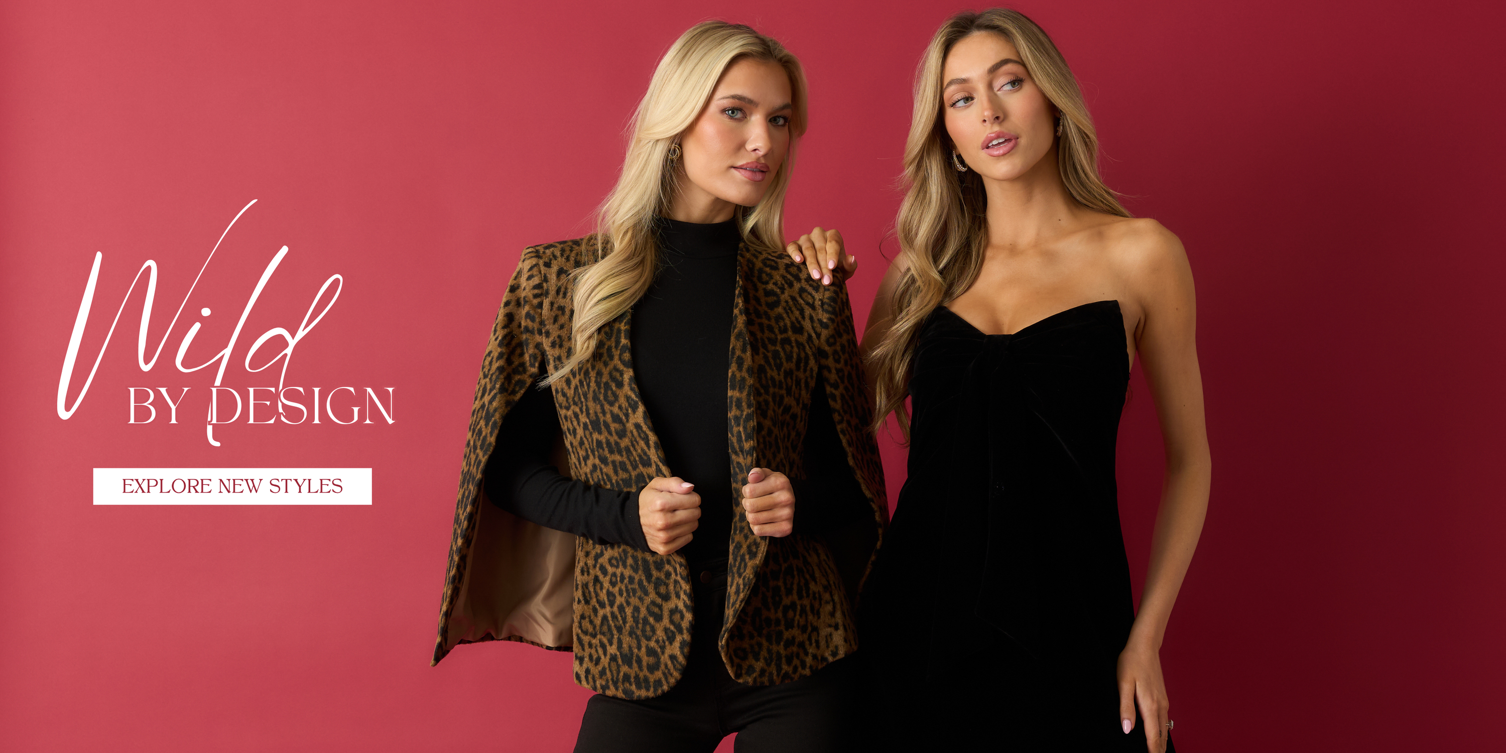 Two women modeling Wild by Design styles, featuring a leopard print blazer and a black strapless dress, against a red background with “Explore New Styles” text.