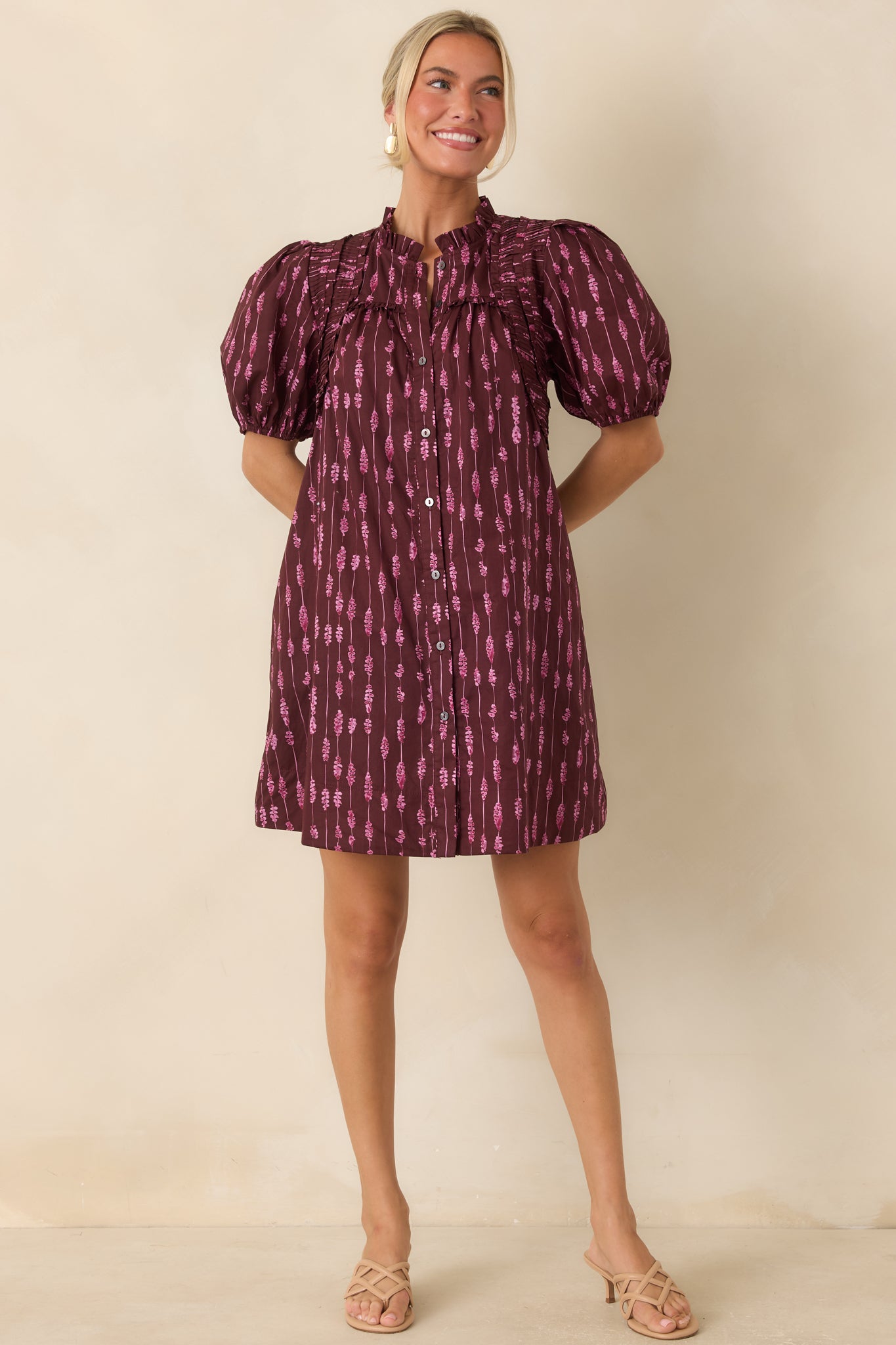 Rich wine cotton dress showcasing a vertical abstract stripe design, softly structured puff sleeves, and convenient side pockets.