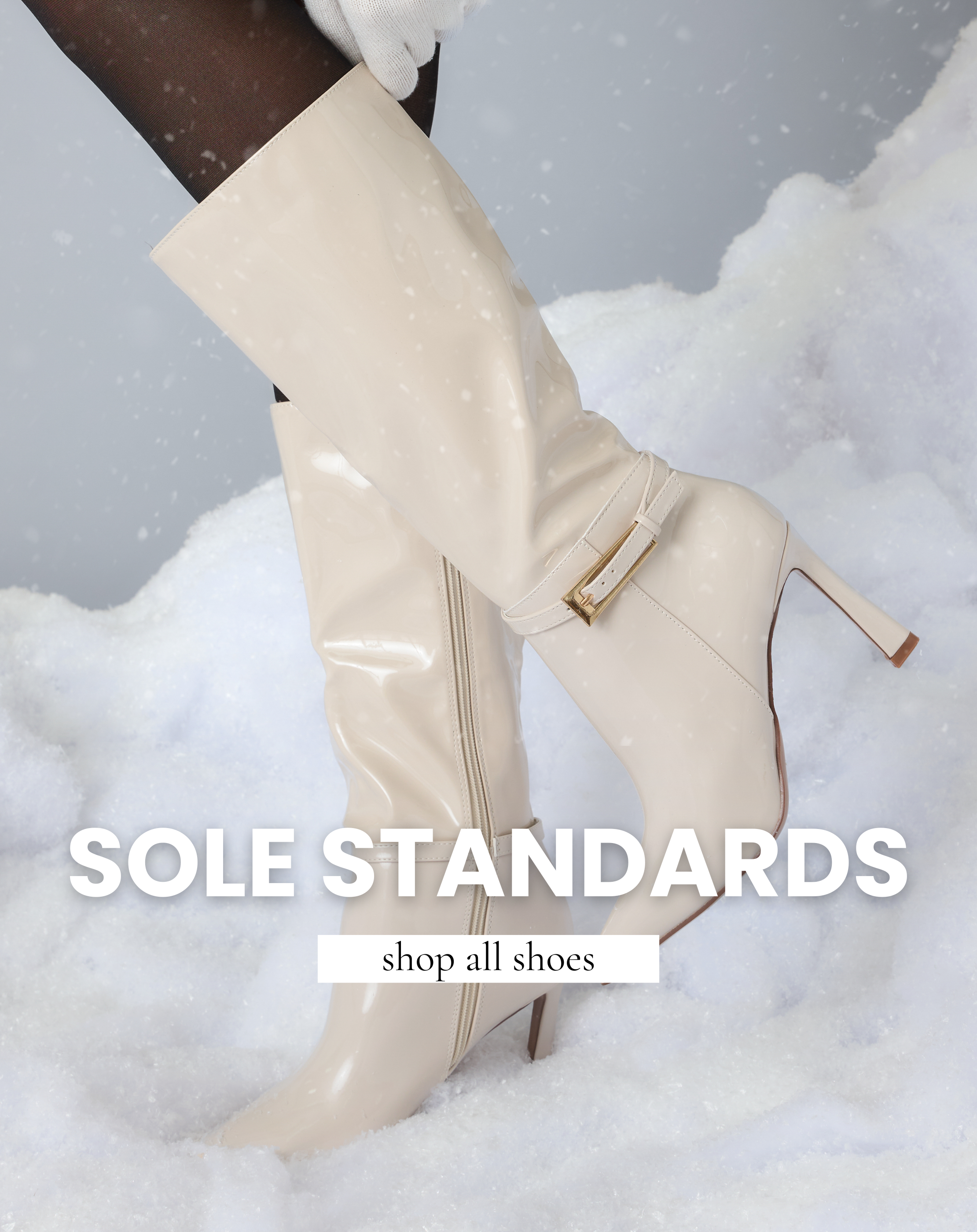Cream knee-high heeled boots styled in the snow, highlighting women’s winter footwear from the All Shoes collection.