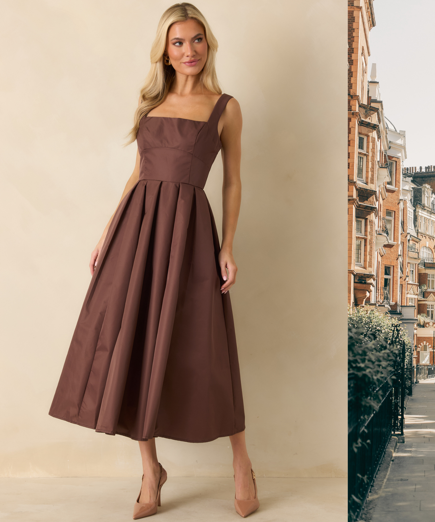 Woman wearing a chocolate brown midi dress against a beige background, with a scenic London backdrop peeking into the frame.