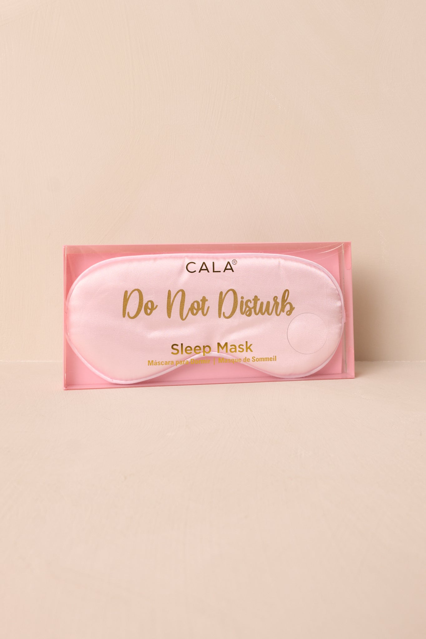 A zoomed-in view of the satin fabric and stitching, highlighting the fine details and quality craftsmanship of the eye mask.