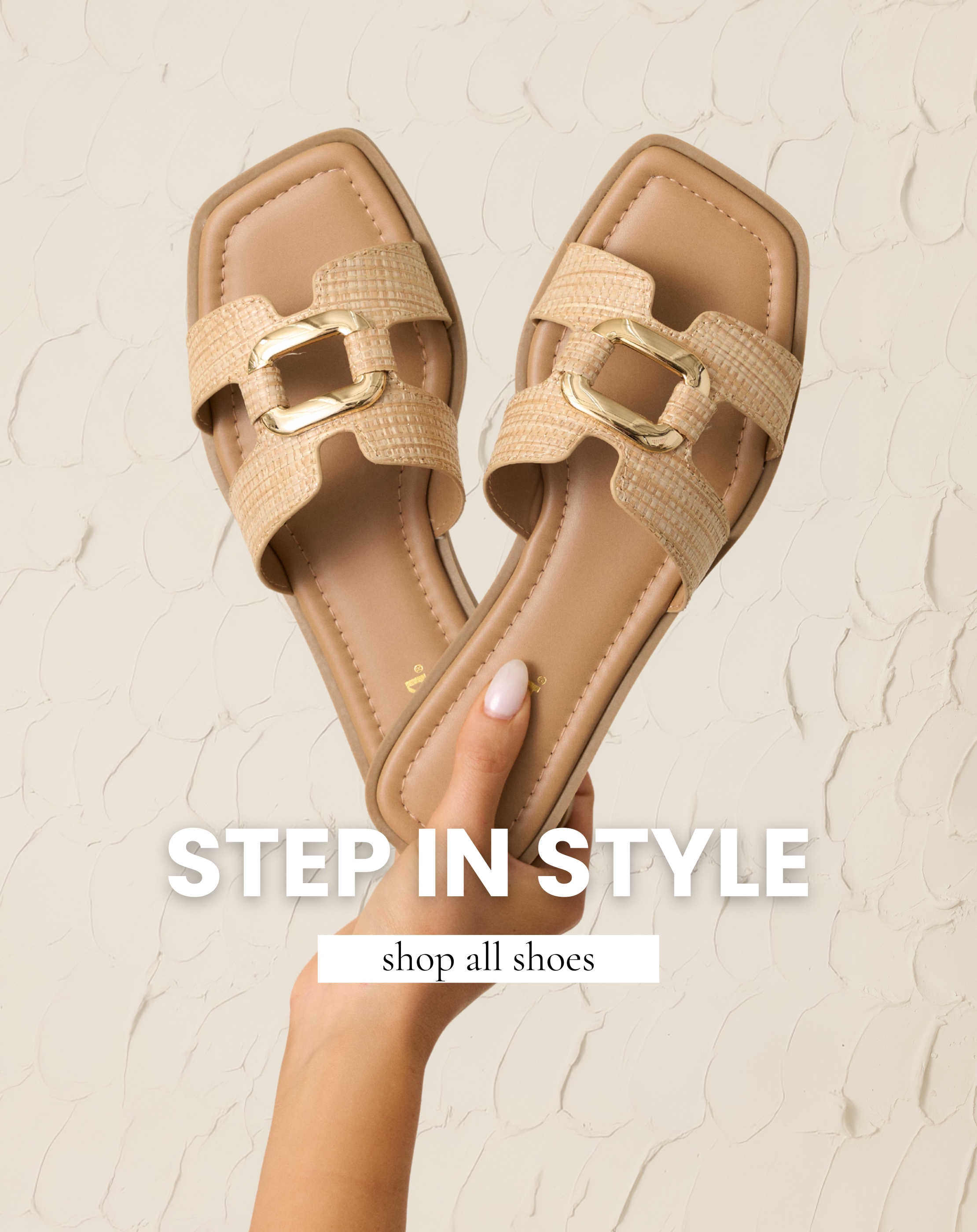 Beige woven slide sandals with gold buckle detail, perfect for everyday summer styling. Shoes are featured in All Shoes. 