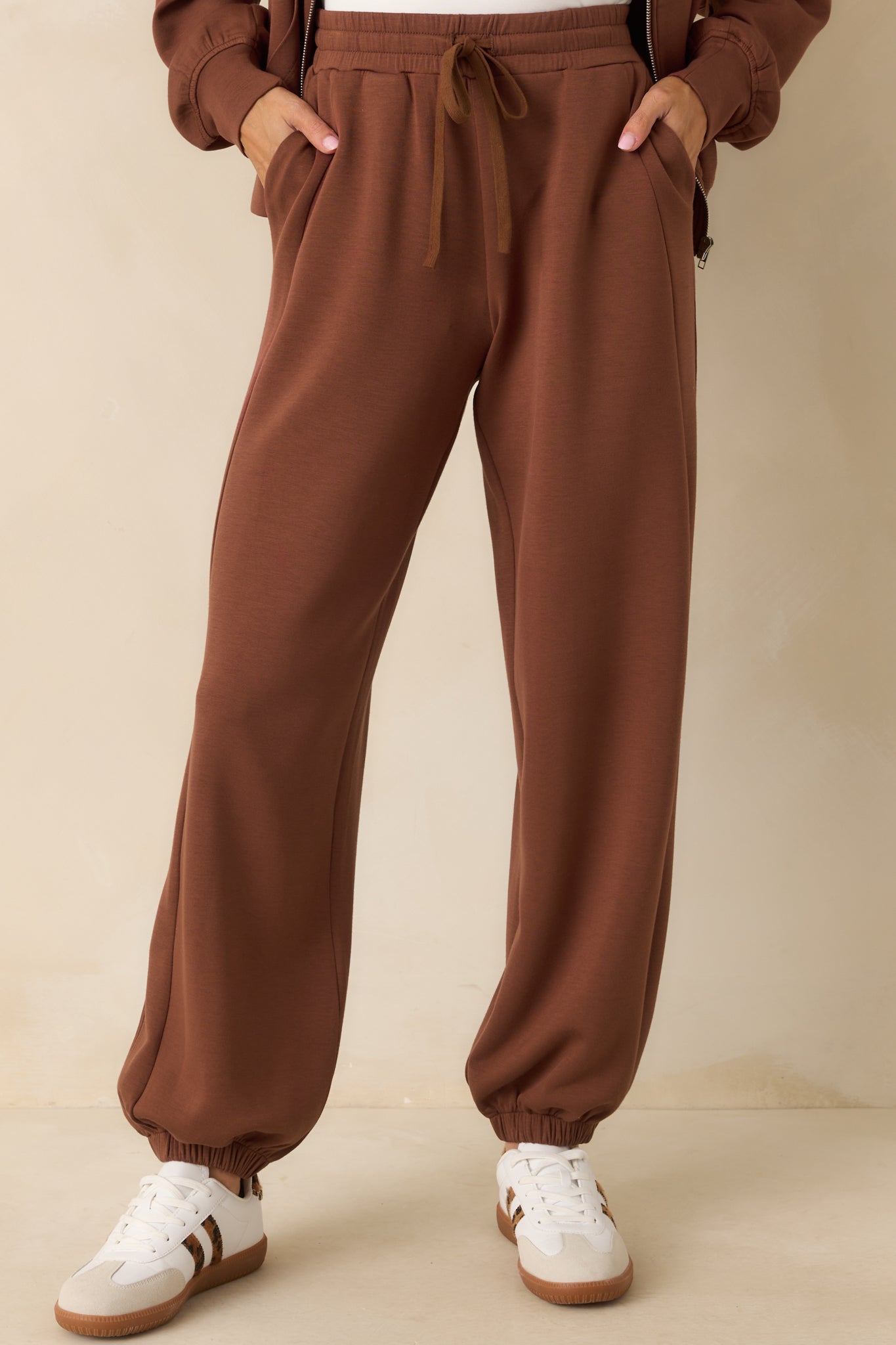 Cropped view focusing on the thick elastic waistband and drawstring detail