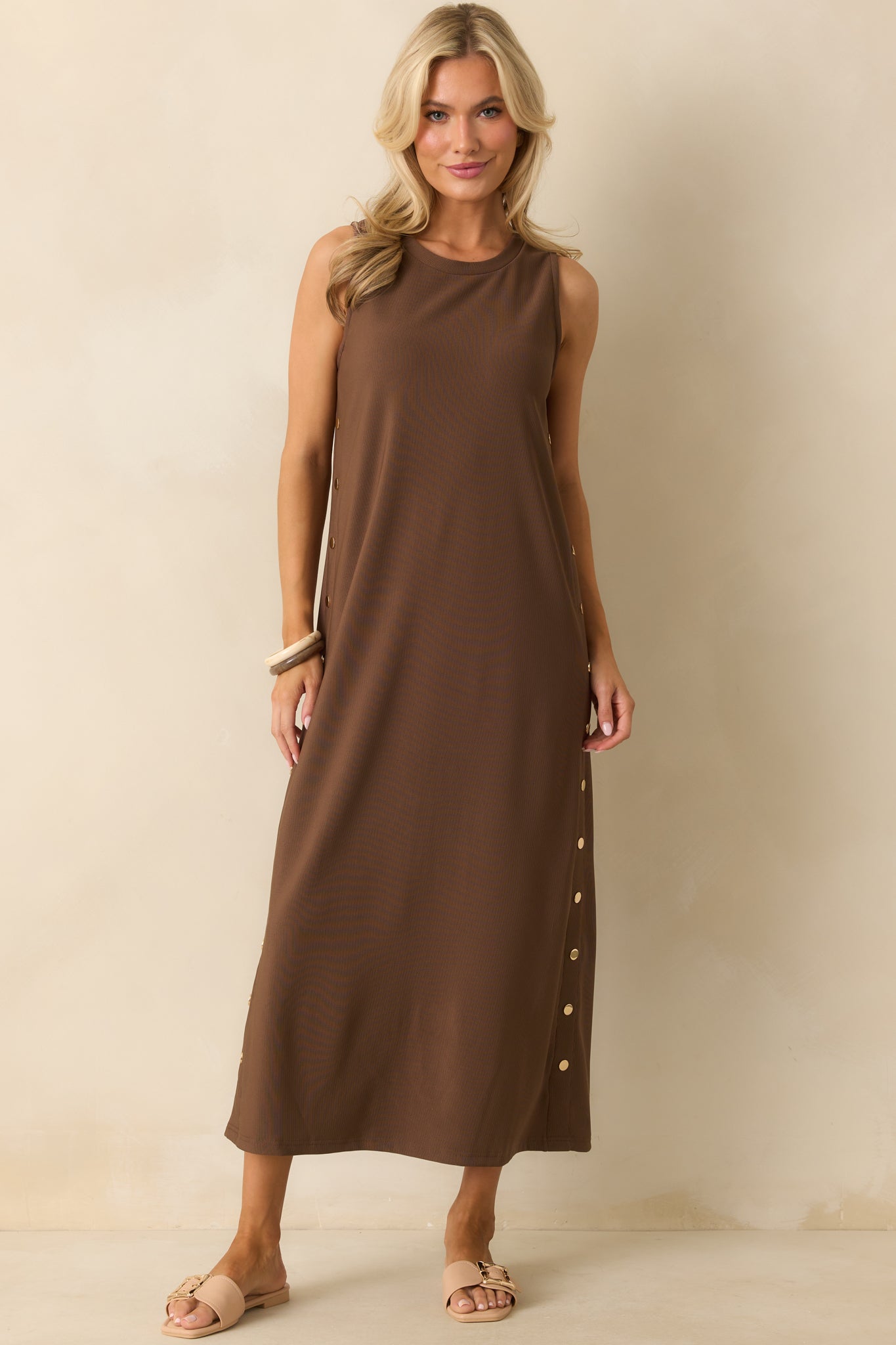 Full body view showing the decorative gold button details along the sides.