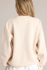 Back view of this natural embroidered sweatshirt that features 