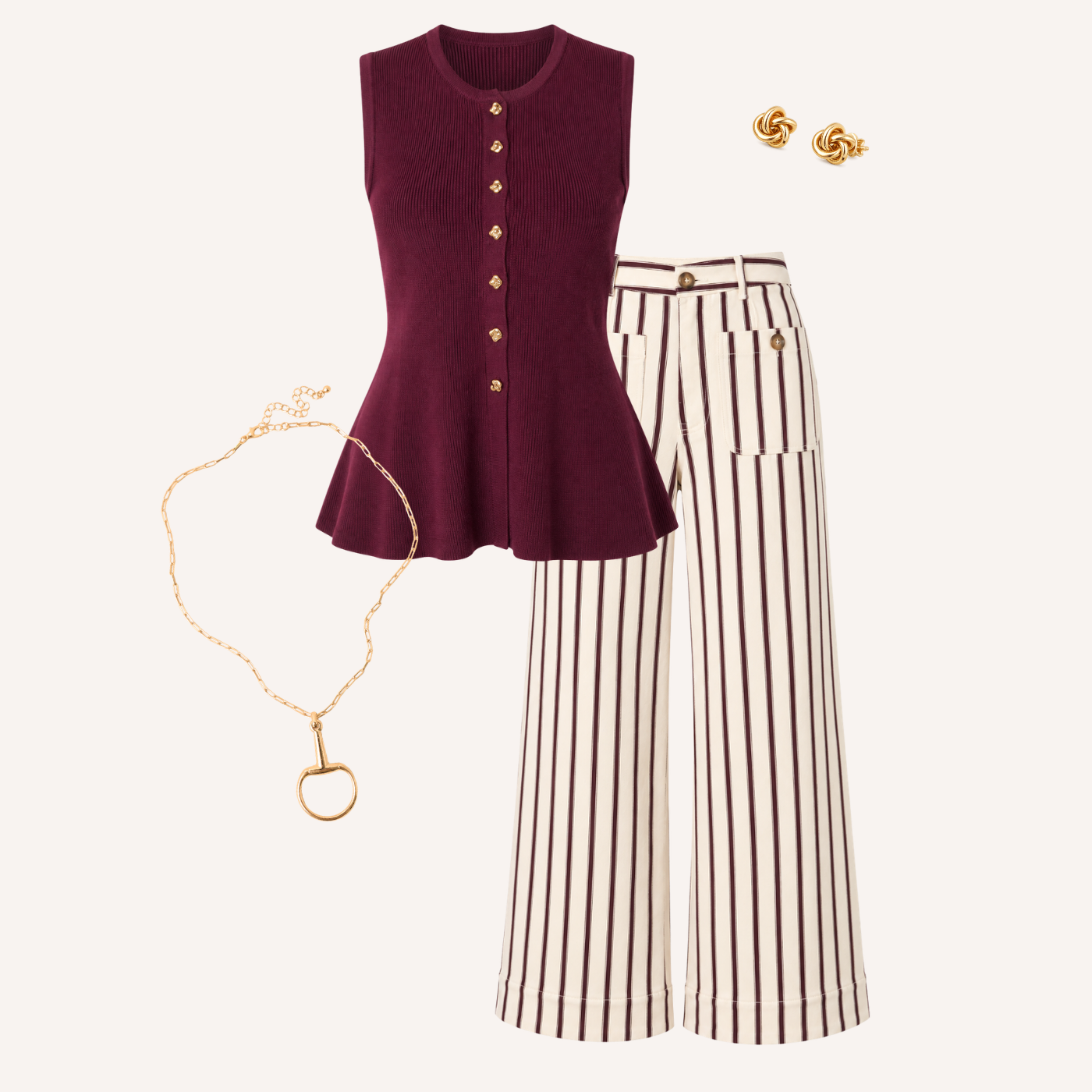 A flat-lay outfit featuring a sleeveless burgundy knit top with gold buttons, cream wide-leg pants with brown vertical stripes, a gold necklace with a horsebit pendant, and a pair of gold stud earrings, all arranged on a light cream background.