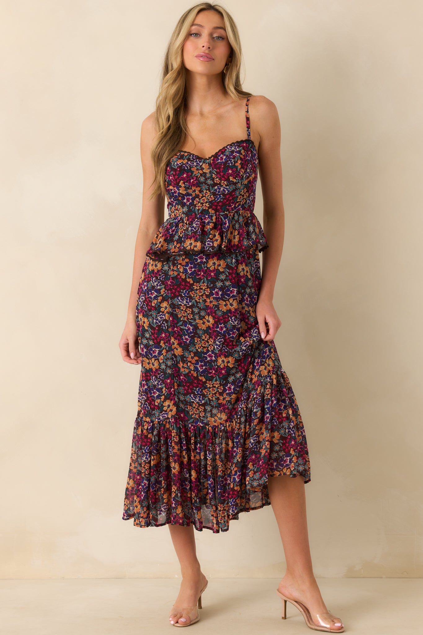 Full-length image of maxi dress with fitted bodice, hidden back zipper, and flowing multicolor tiered skirt.
