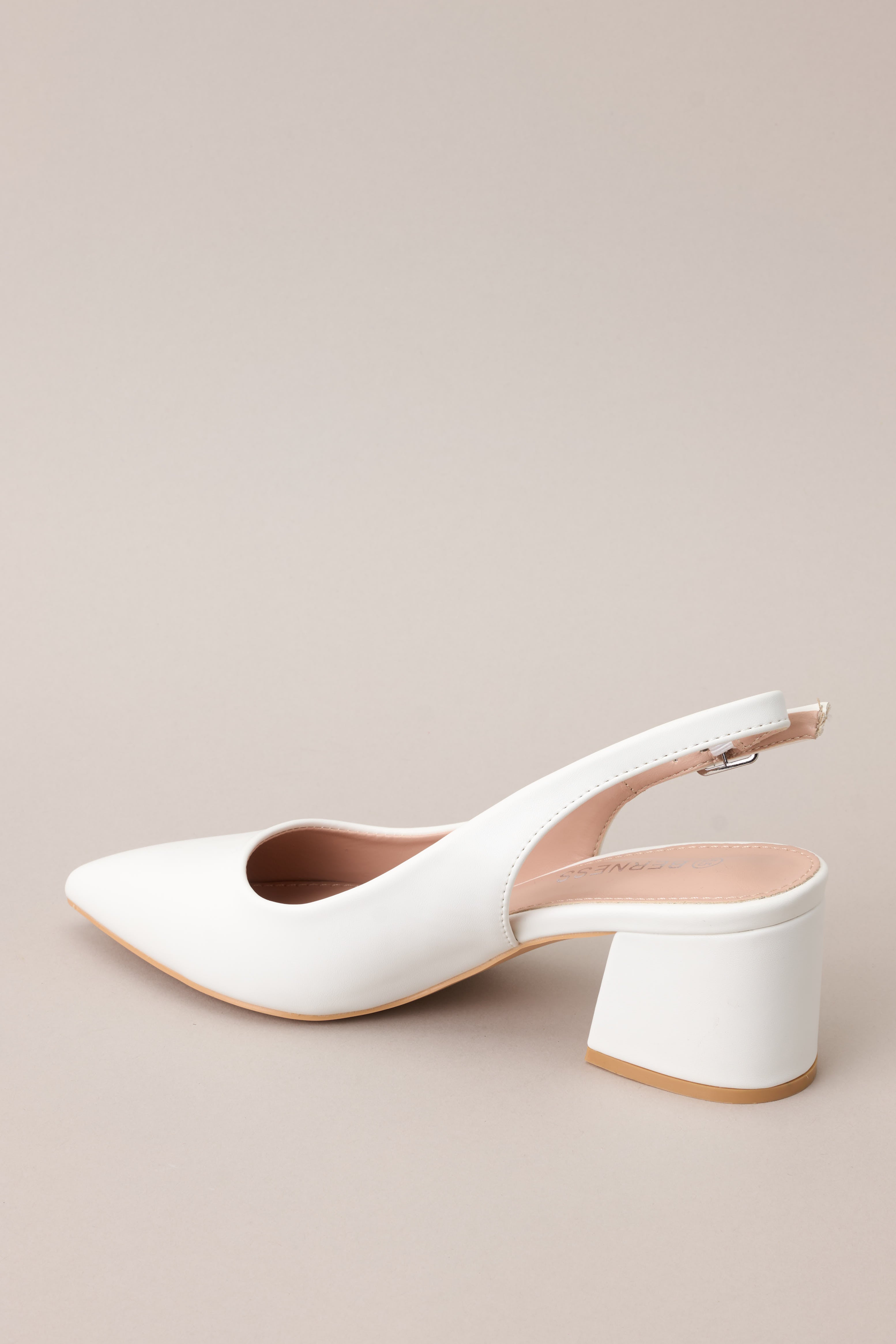 A slightly angled shot highlighting the thick heel and how it balances the structure of the shoe.