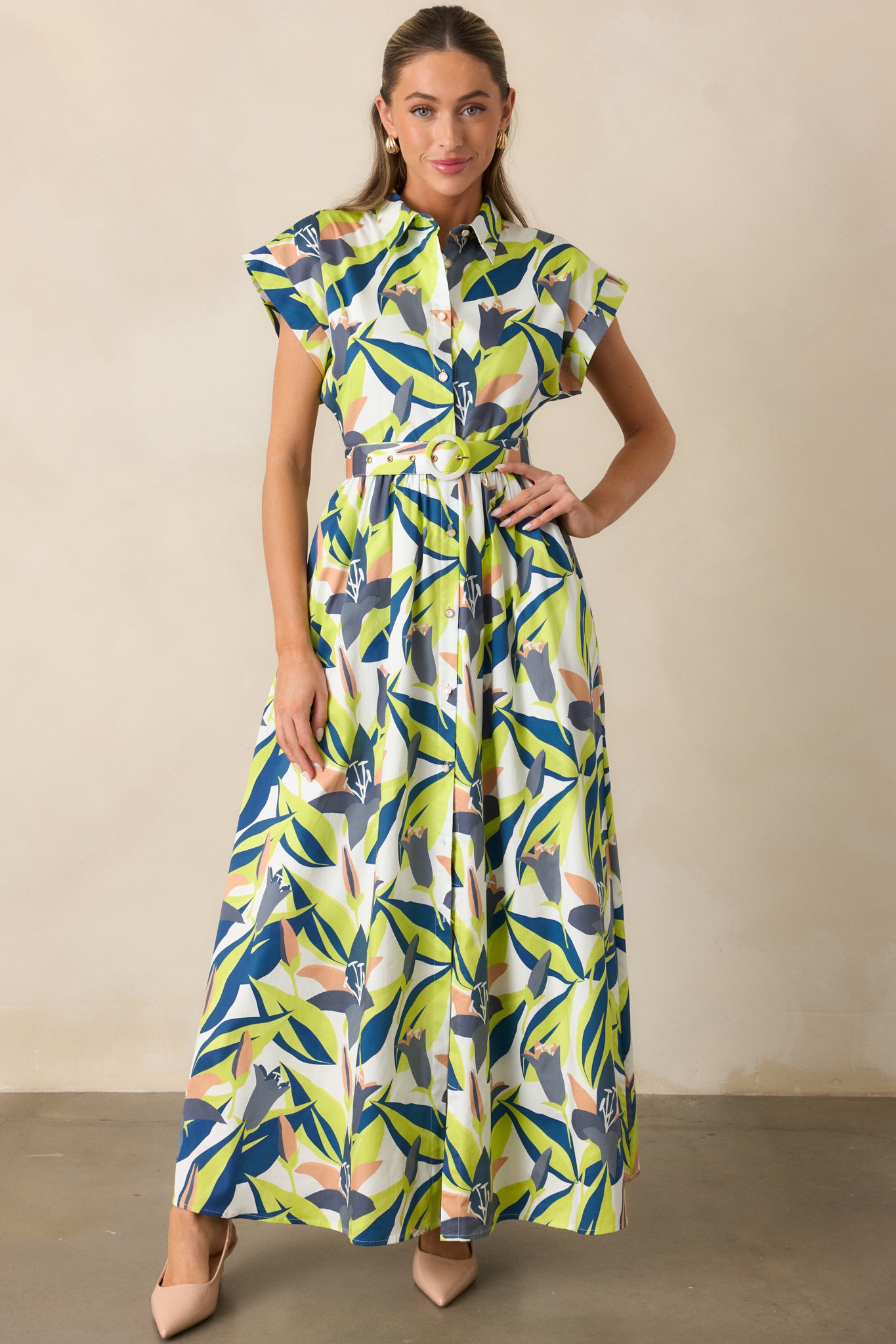 Collared maxi dress with cuffed short sleeves and vibrant multicolor floral print, shown front facing.