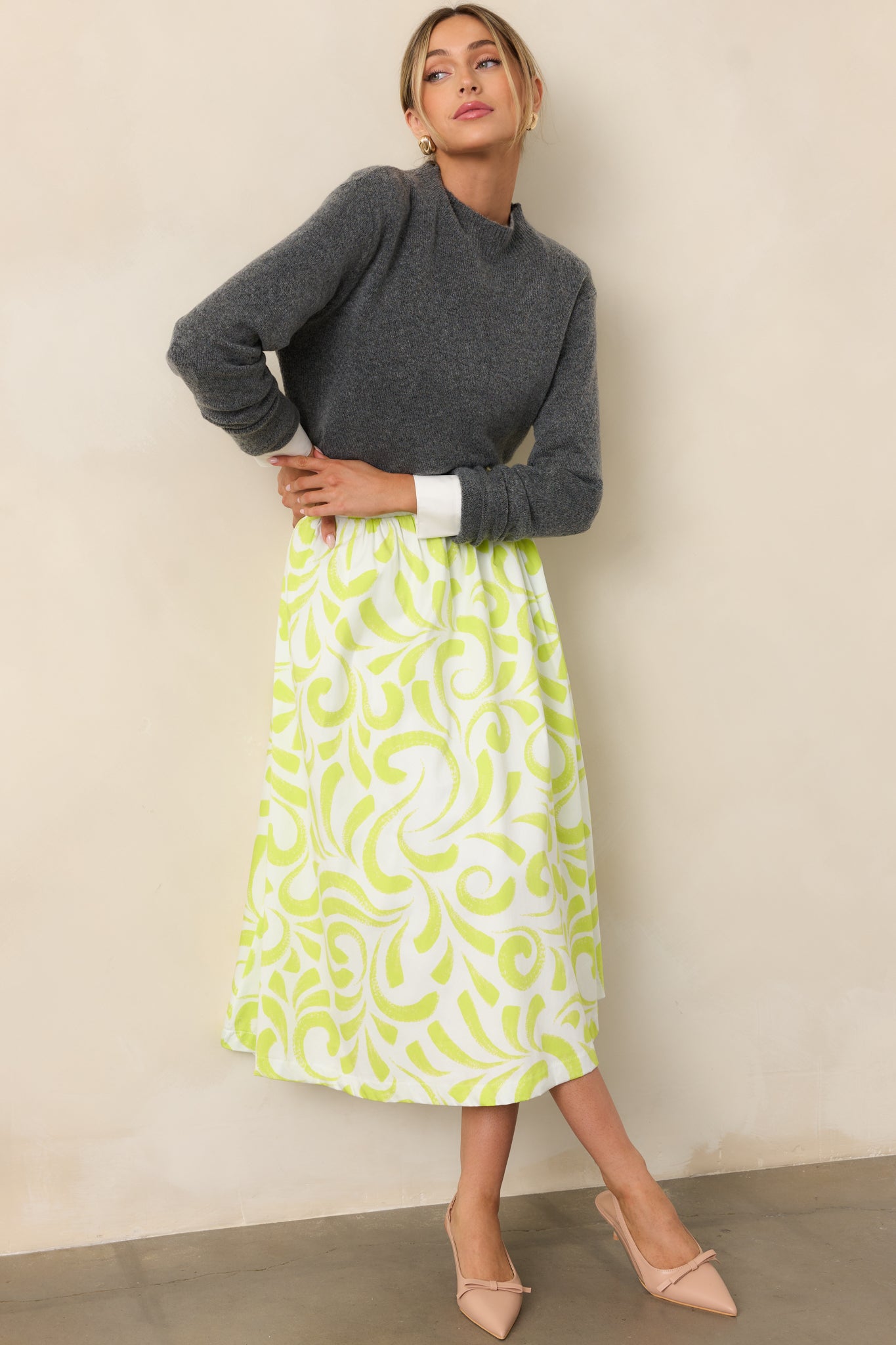 Front view of midi skirt with lime green and white brush stroke print.
