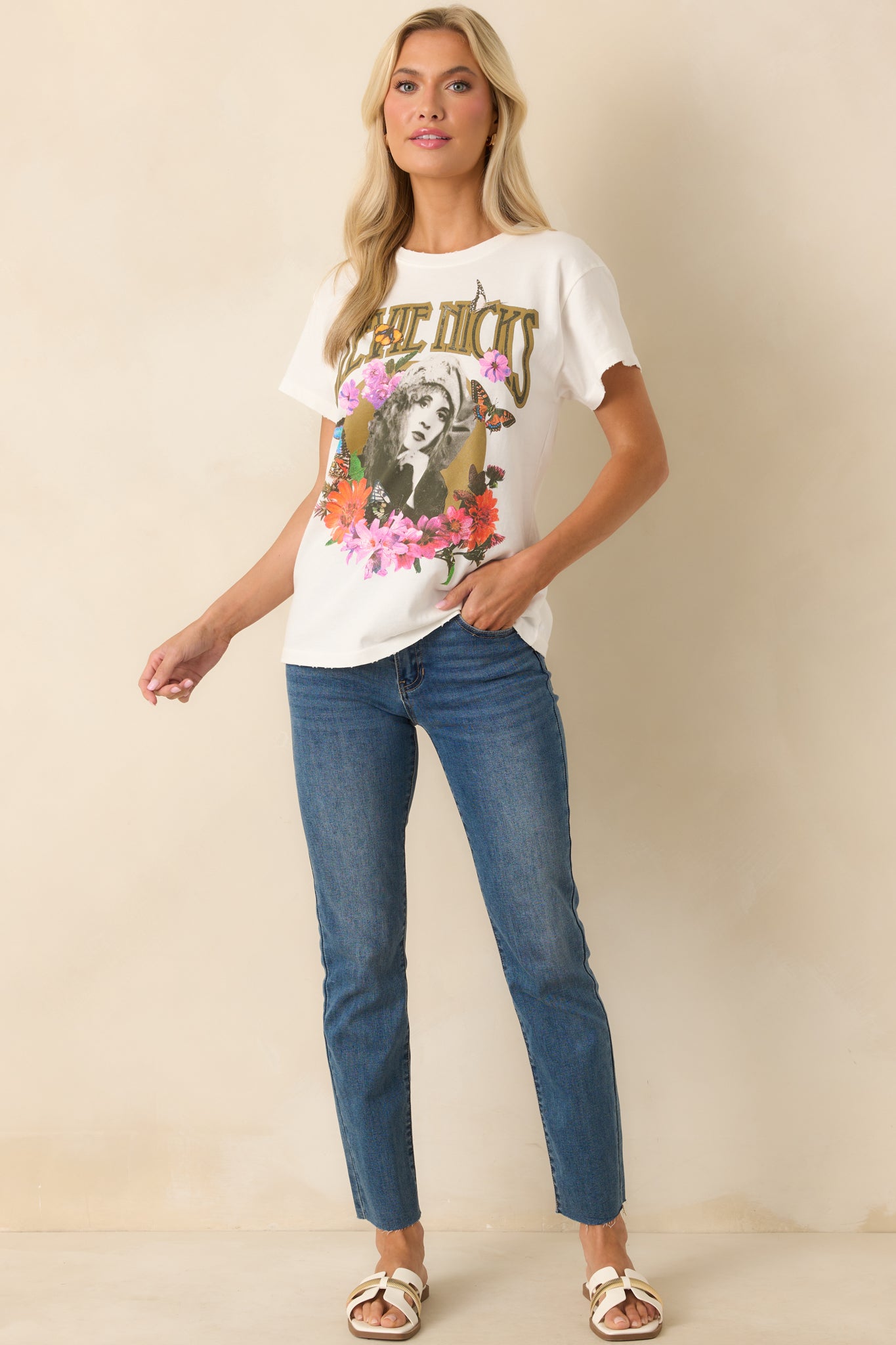Full body front view of the white tee featuring a graphic portrait of Stevie Nicks framed by a floral collage.