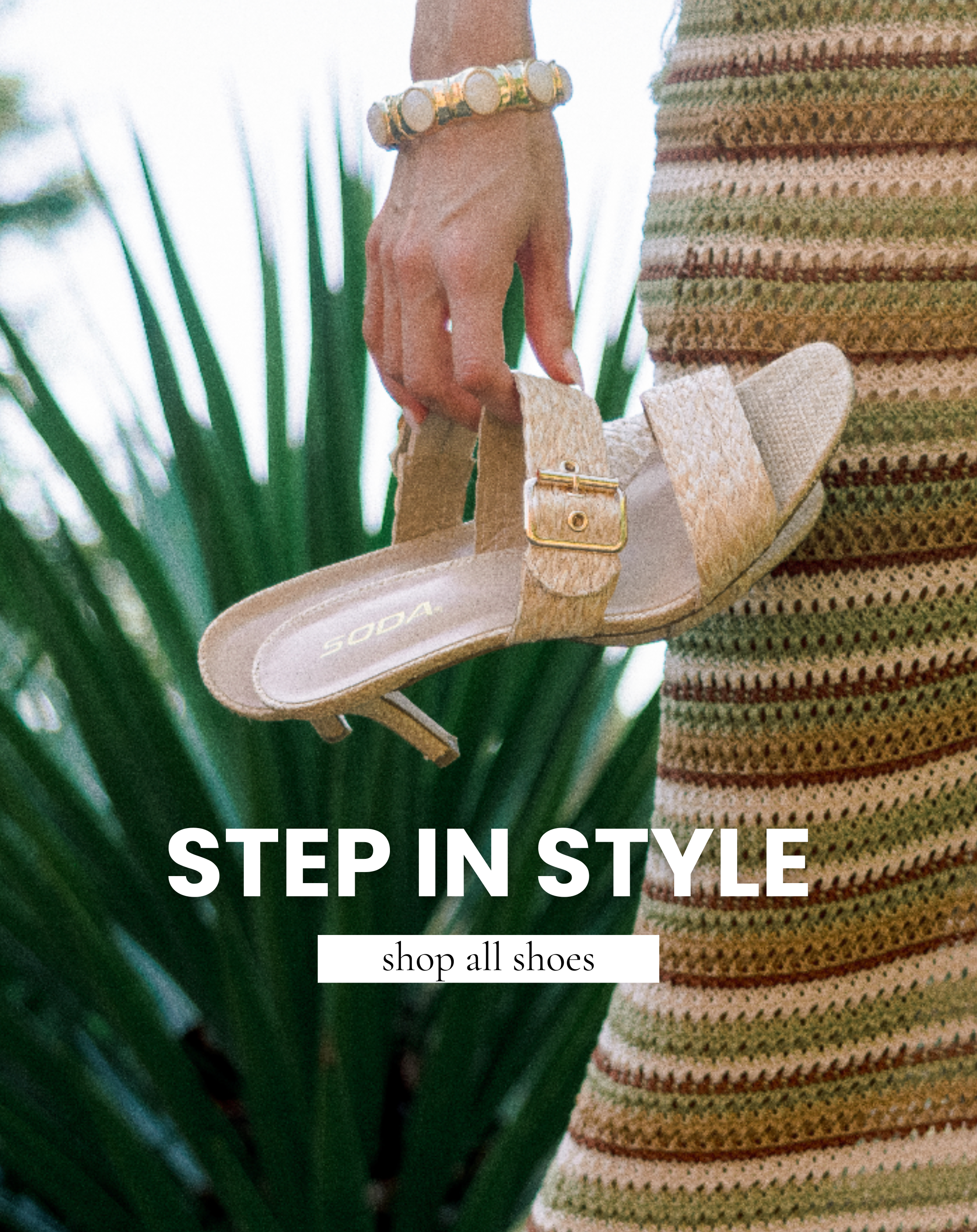 Close-up of neutral woven heeled sandals with gold buckle detail styled with a striped crochet skirt for a women’s summer shoes collection.