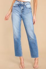 These light wash jeans feature a tapered leg, seam detailing, functional front and back pockets, and belt loops. 