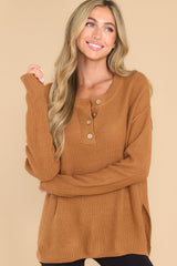 Front view of this sweater that features a waffle knit texture throughout.