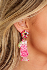 These pink earrings feature pink drink glass with lime and pearl beaded design.