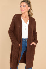 Front view of this cardigan that features functional pockets.