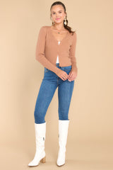 Full body view of this cardigan that features a ribbed material throughout.