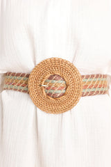 This multi-colored belt features a circular belt buckle, and a woven material.