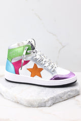 Full view of these shoes that feature a high top design, multi colors throughout, and additional laces.
