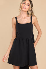 Front view of this dress that features a square neckline.