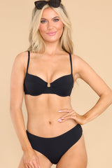 Front view of this bikini top that features wired cups with removable pads, adjustable thin straps, and a self-tie back closure.